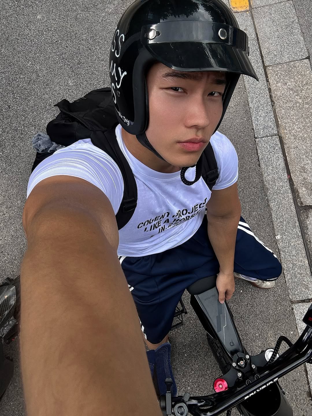 Photo by zhenhao_cai on August 11, 2025. May be an image of 1 person, segway, skateboard, bicycle, helmet, scooter and text.