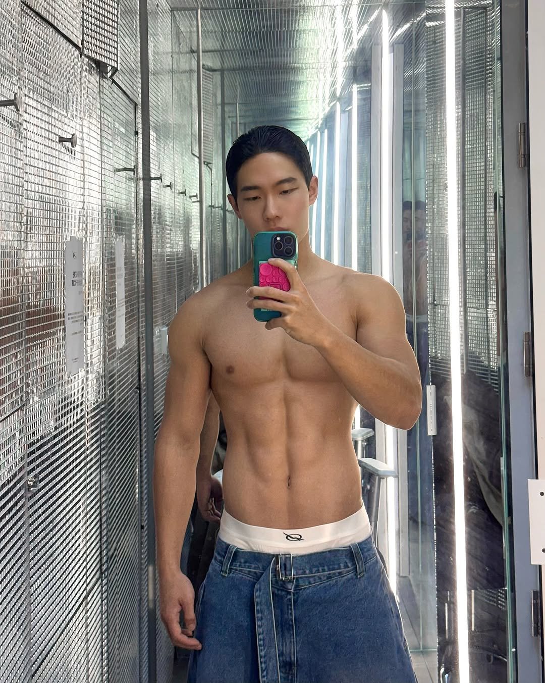 Photo shared by zhenhao_cai on November 06, 2025 tagging @51percent_official. May be an image of one or more people, biceps, people bodybuilding, mirror and text.