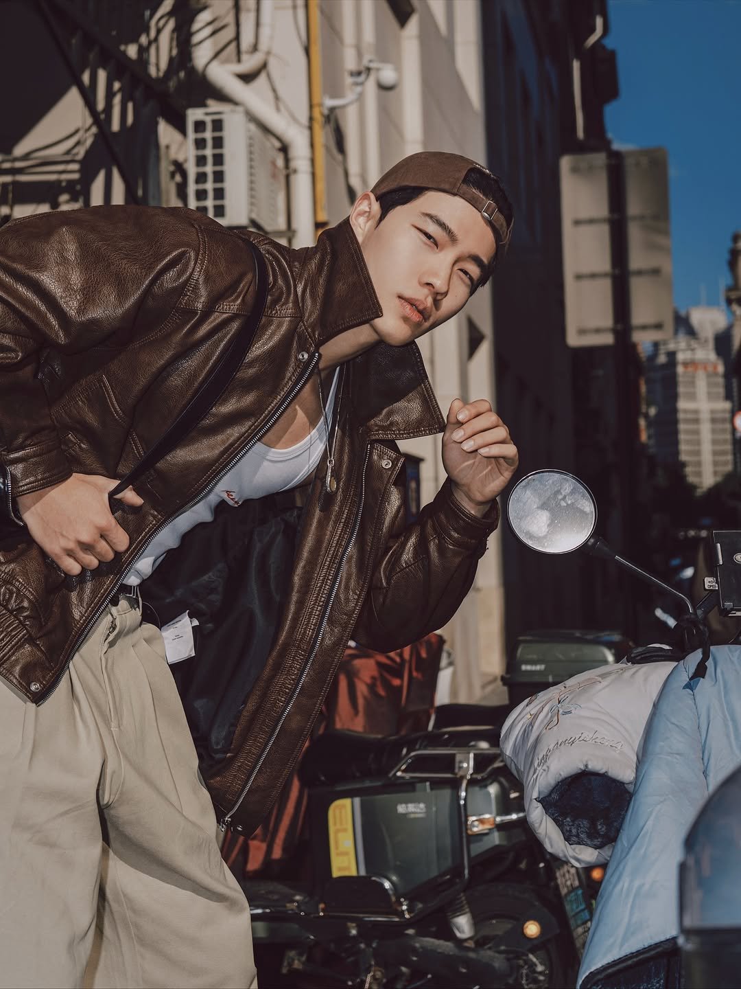 Photo by zhenhao_cai on November 08, 2025. May be an image of overcoat, bolo tie and text.