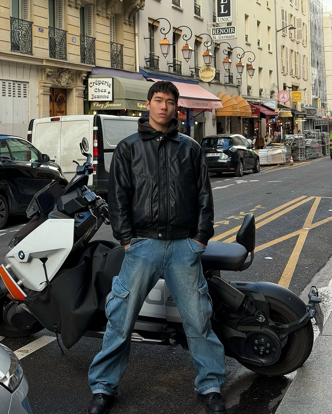 Photo by zhenhao_cai on February 16, 2026. May be an image of motorcycle, scooter, street and text.