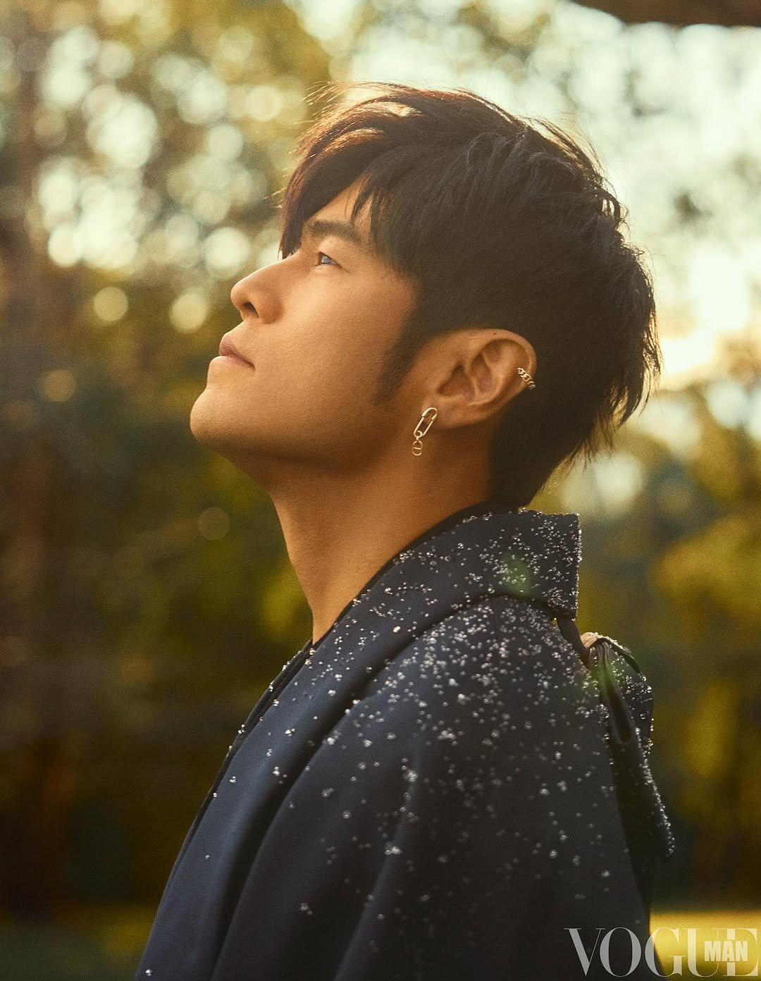 Photo by Jay Chou 周杰倫 on September 22, 2025. May be an image of 1 person, bangs, bolo tie and text that says 'VOGIMAN MẶN'.