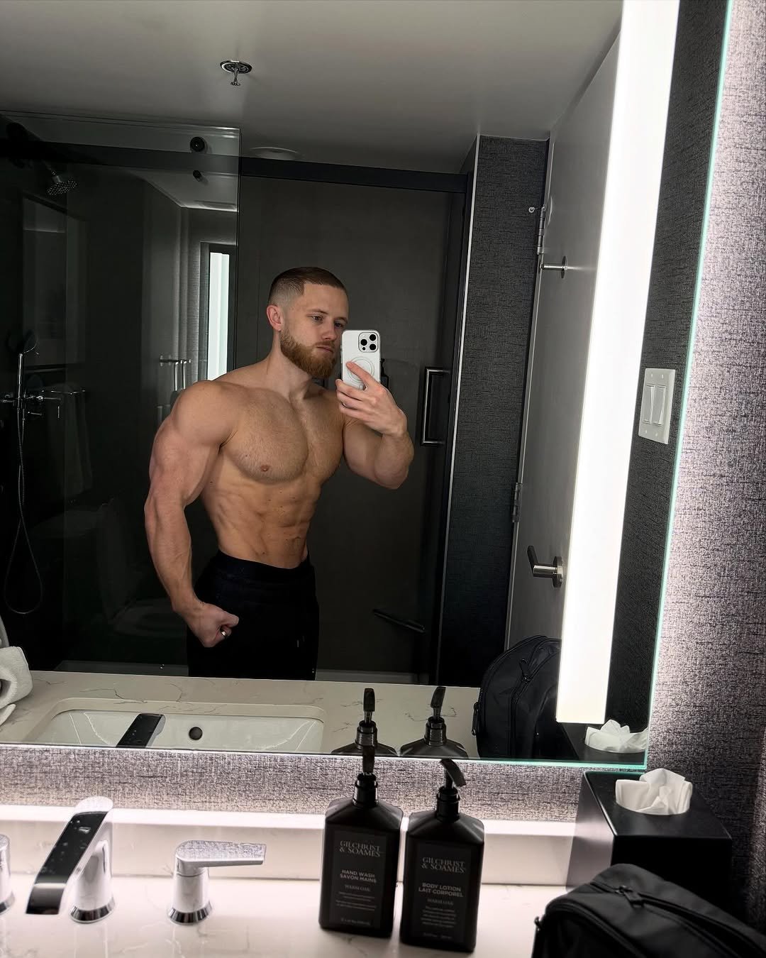 Photo shared by Jeff Nippard on January 15, 2026 tagging @macrofactorapp. May be a selfie of one or more people, beard, biceps, people bodybuilding and text.