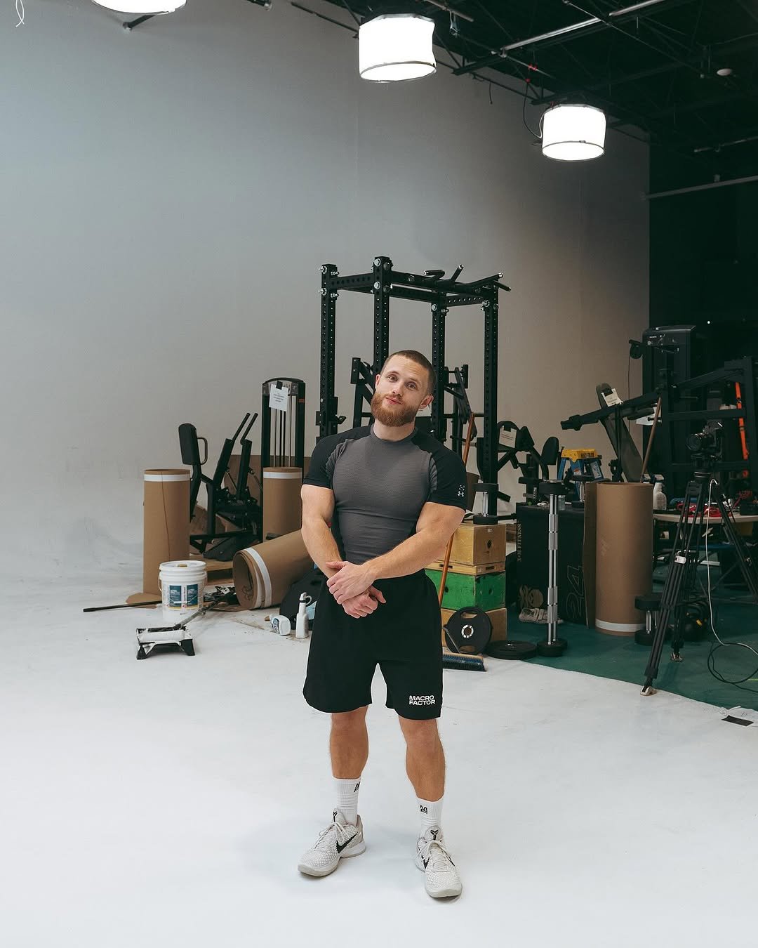 Photo shared by Jeff Nippard on December 31, 2025 tagging @tylorkc, and @macrofactorapp. May be an image of one or more people, biceps, people standing, activewear, sportswear and text.