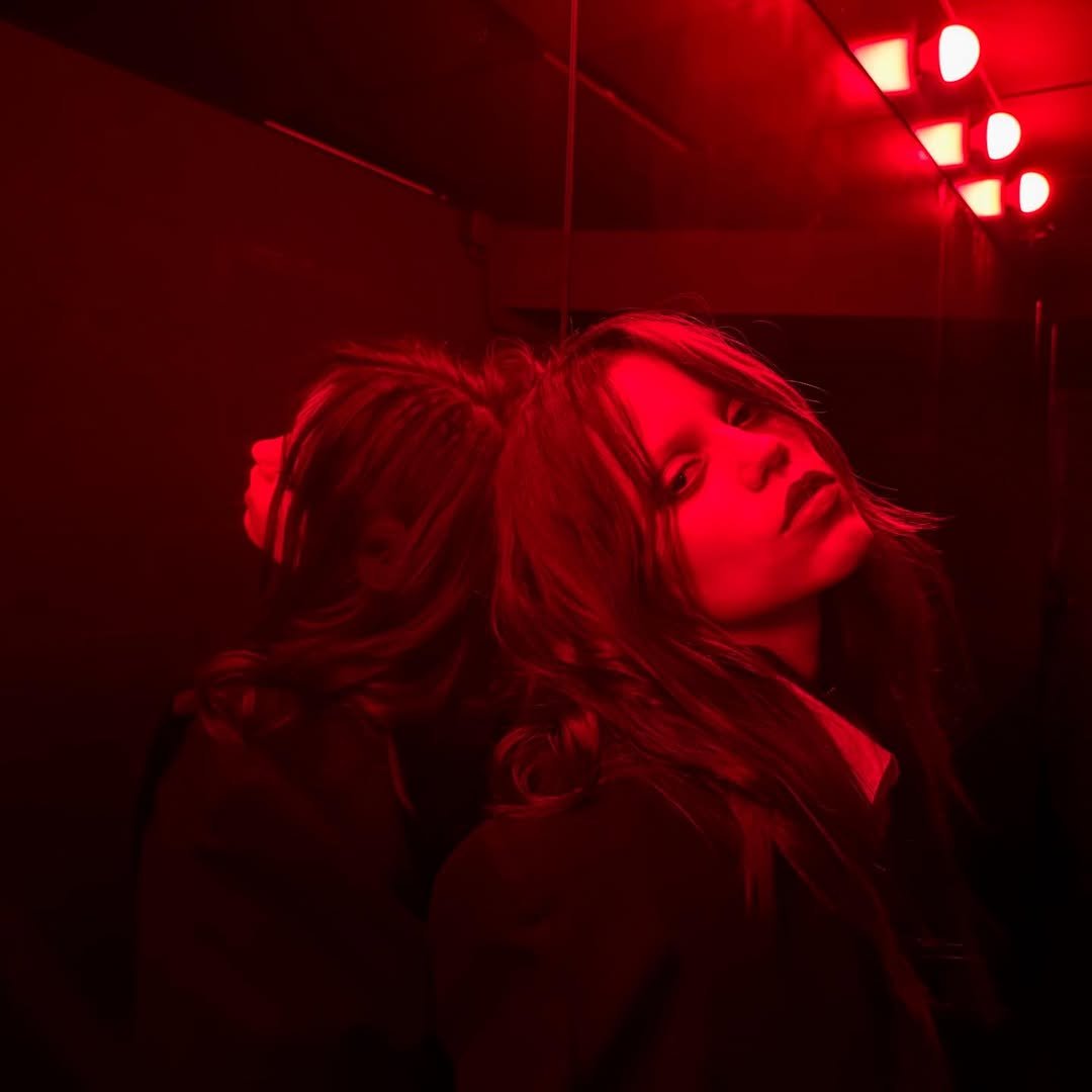 Photo by Jenna Ortega on October 02, 2025. May be an image of 2 people, hair, mirror and text.