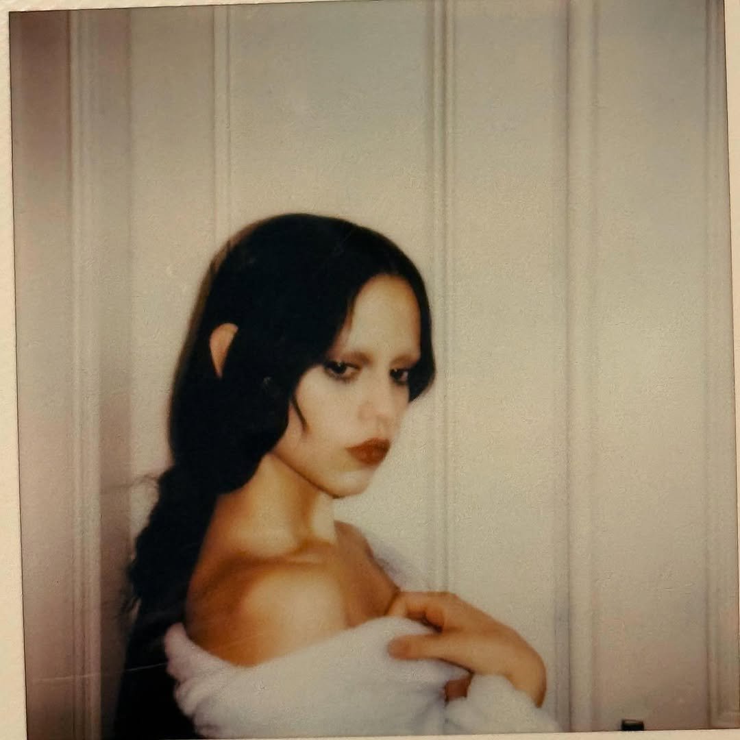 Photo by Jenna Ortega on September 01, 2025. May be an image of one or more people, makeup, hair and polaroid.