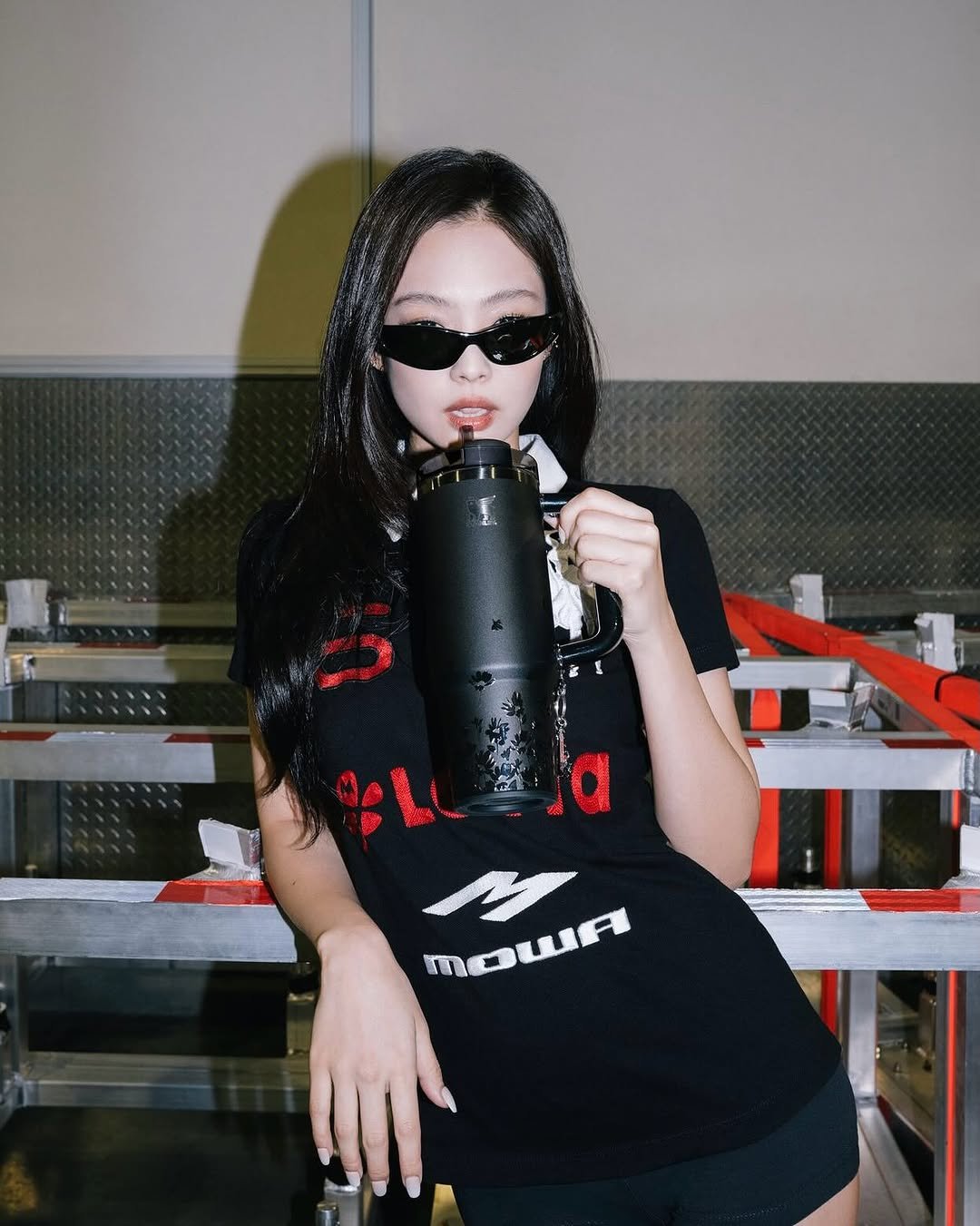 Photo shared by JENNIE HQ on September 18, 2025 tagging @stanley_brand, and @jennierubyjane. May be an image of tanktop, glasses and sportswear.