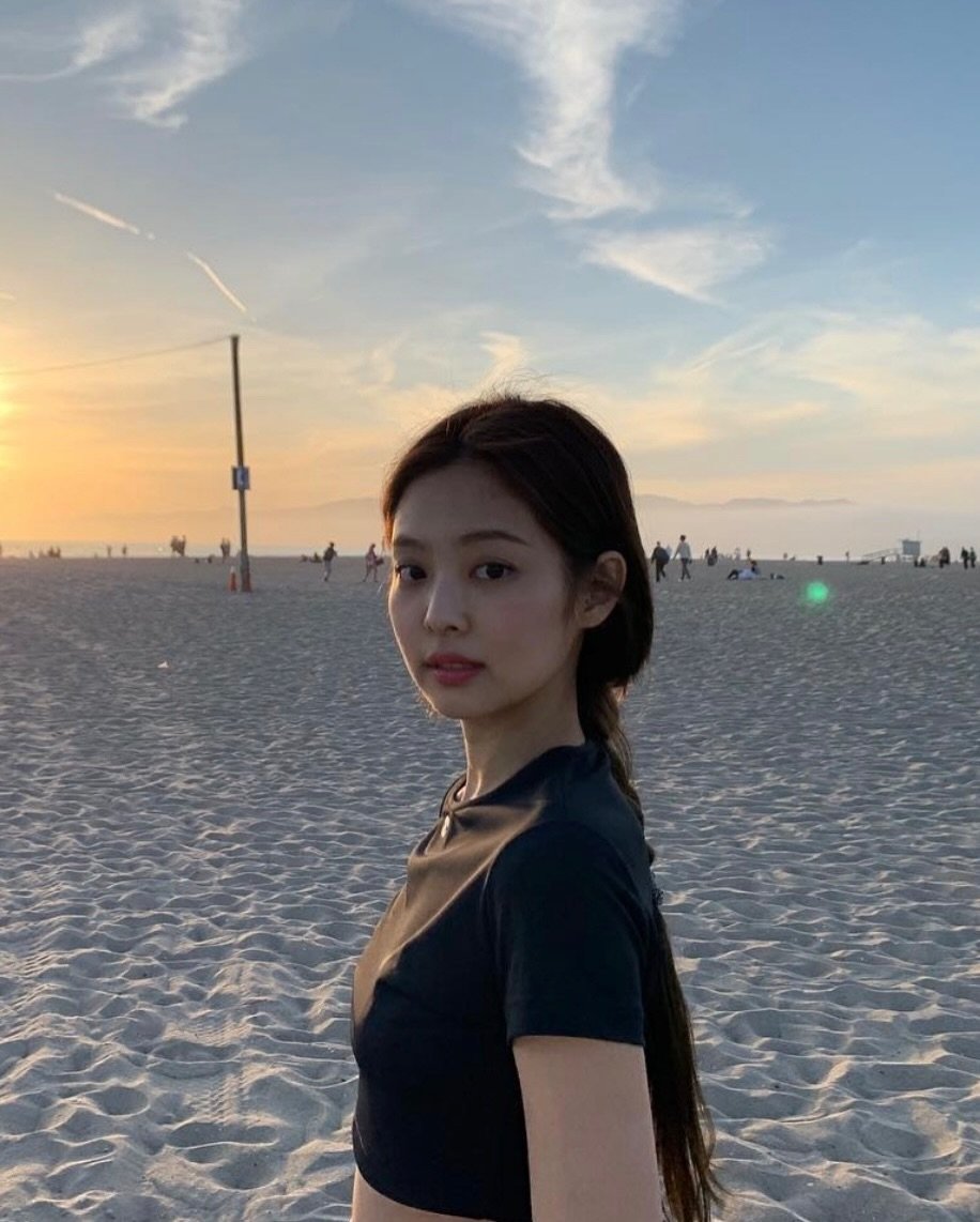 Photo by JENNIE FANPAGE ♡︎ on February 13, 2026. May be an image of activewear, beach and text.