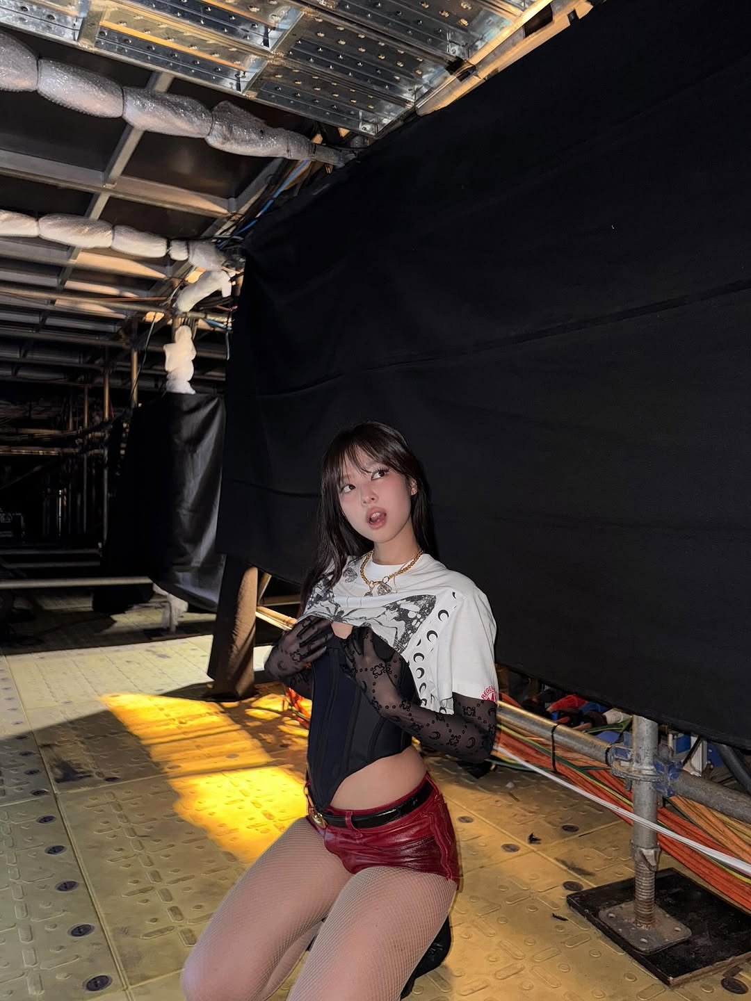 Photo by J on October 30, 2025. May be an image of miniskirt, fishnet stockings, underwear and text.