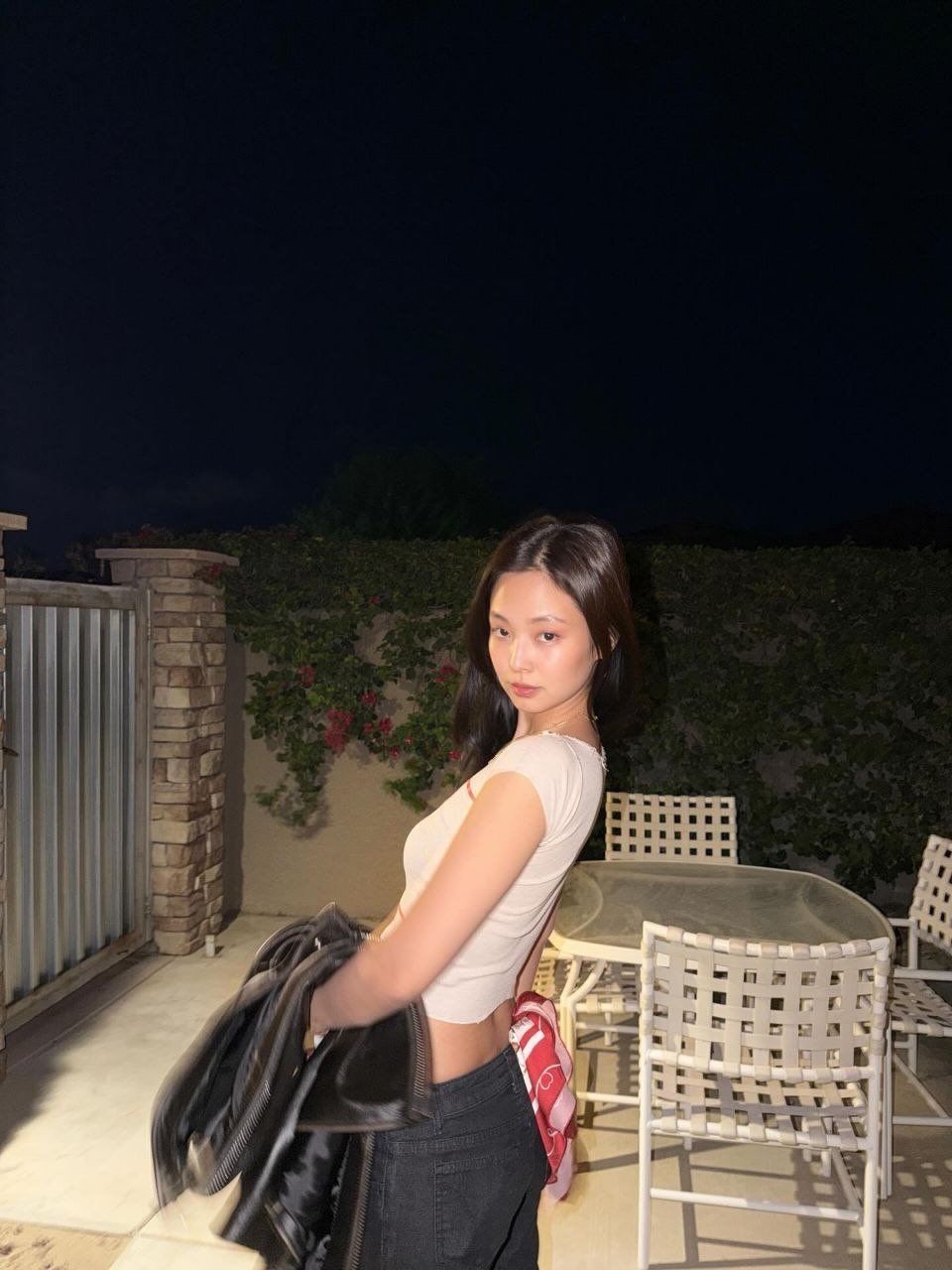 Photo shared by JENNIE BLACKPINK on April 14, 2026 tagging @blackpinkofficial, @jennierubyjane, and @lesyeuxdenini. May be an image of one or more people, hair and text.