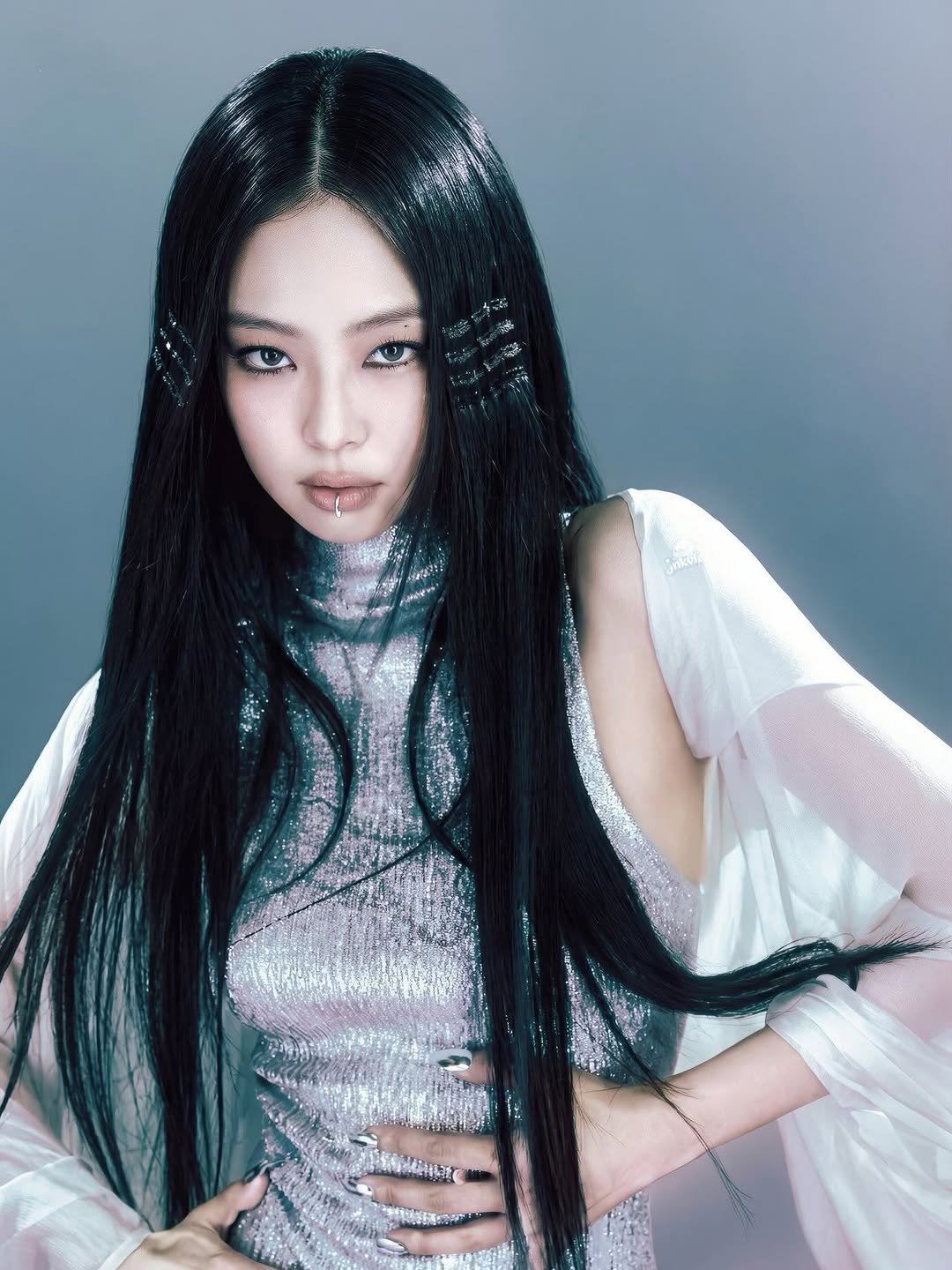 Photo shared by JENNIE BLACKPINK on February 18, 2026 tagging @blackpinkofficial, @jennierubyjane, and @lesyeuxdenini. May be an image of one or more people, braids, makeup and text.