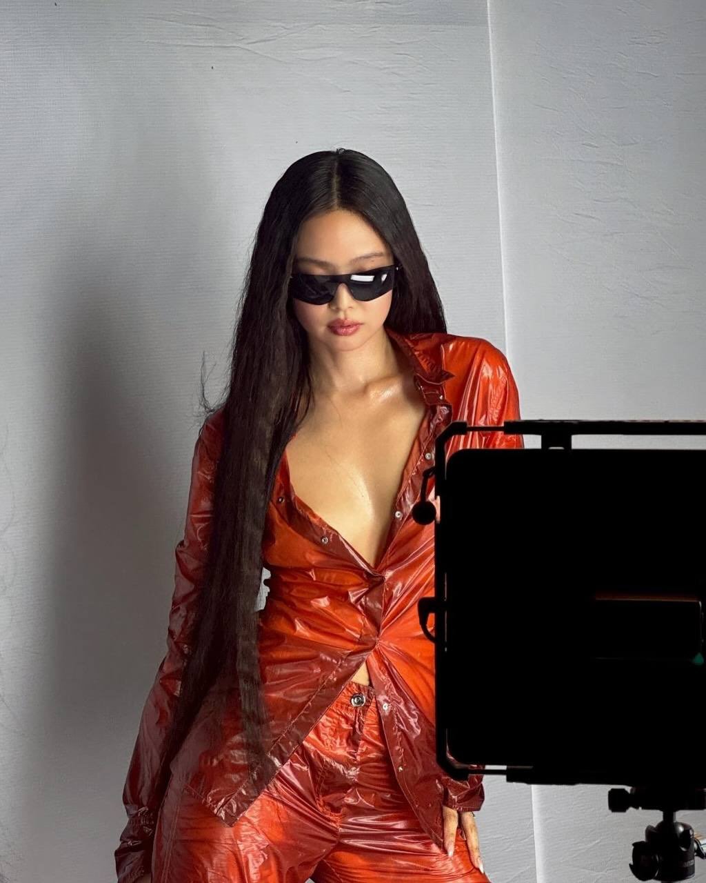 Photo shared by JENNIE BLACKPINK on April 10, 2026 tagging @blackpinkofficial, @jennierubyjane, and @lesyeuxdenini. May be an image of one or more people, makeup, dress and text.