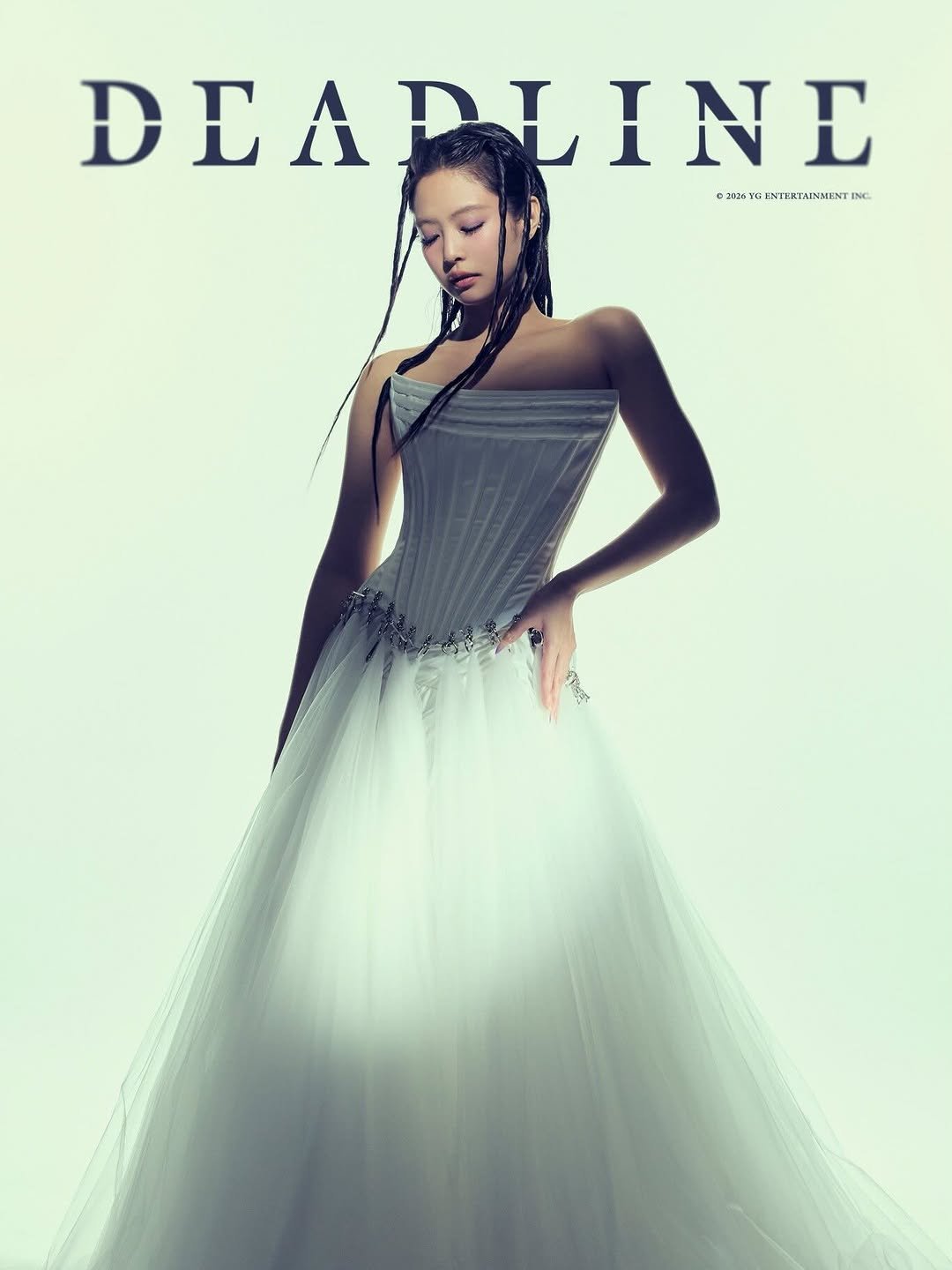 Photo shared by JENNIE BLACKPINK on February 08, 2026 tagging @blackpinkofficial, @jennierubyjane, and @lesyeuxdenini. May be an image of magazine, dress, poster, gown and text.