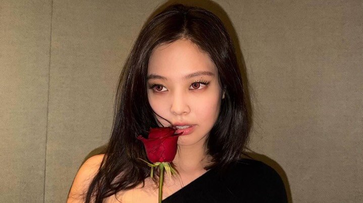 Photo shared by JENNIE BLACKPINK on February 05, 2026 tagging @blackpinkofficial, @jennierubyjane, and @lesyeuxdenini. May be an image of rose and text.