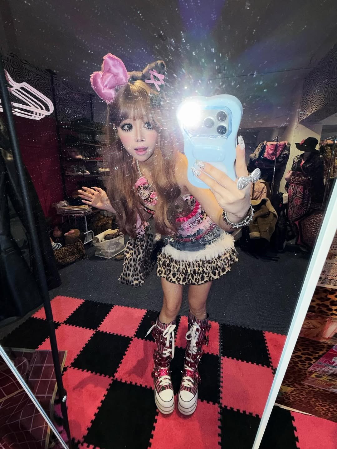 Photo by 유정 YUJEONG on December 30, 2025. May be a selfie of costume, miniskirt, fishnet stockings, headdress and text.