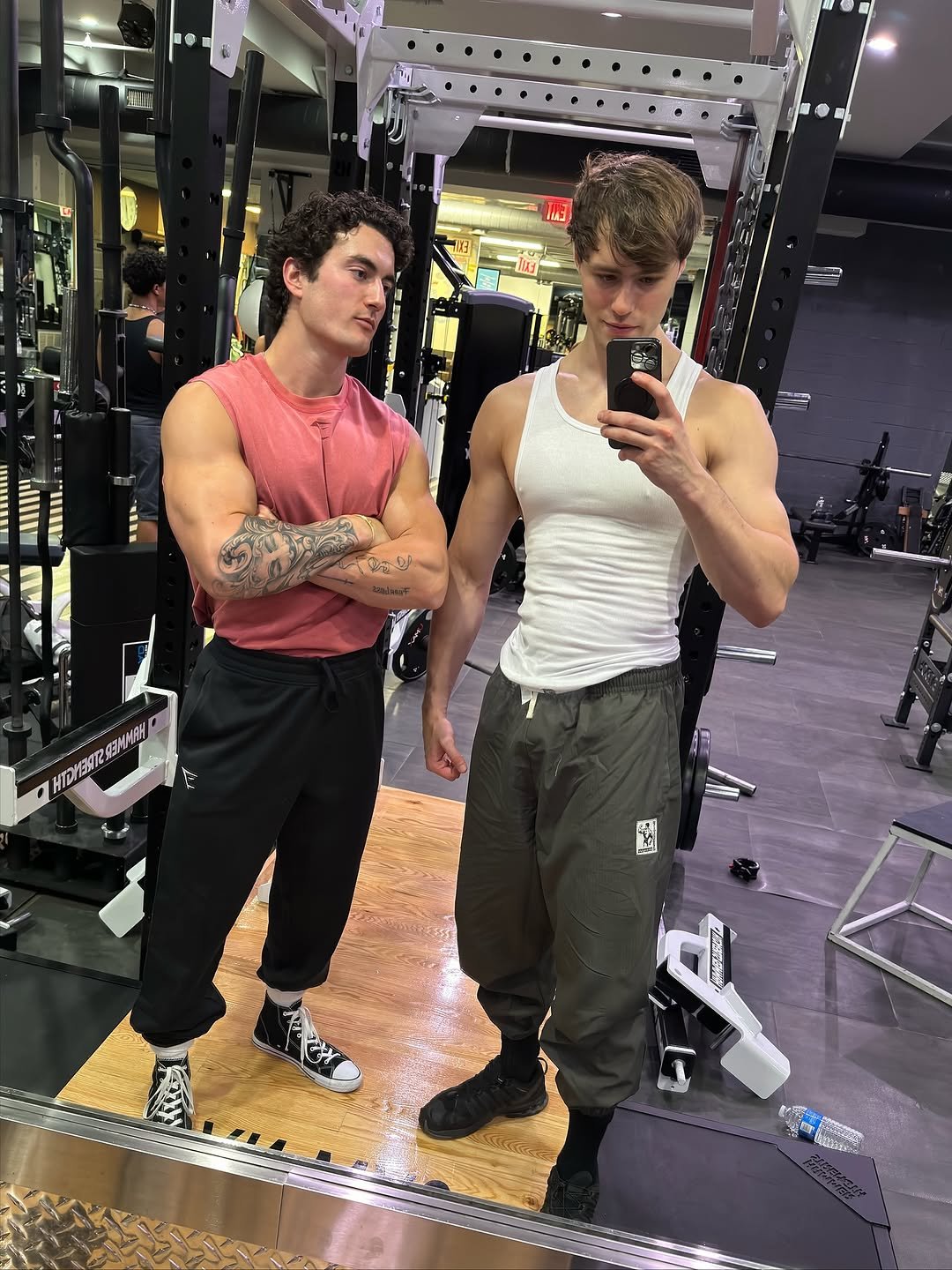 Photo shared by Jesse James West on November 16, 2025 tagging @gymshark. May be an image of one or more people, biceps, people bodybuilding, sportswear, sweatpants and text.