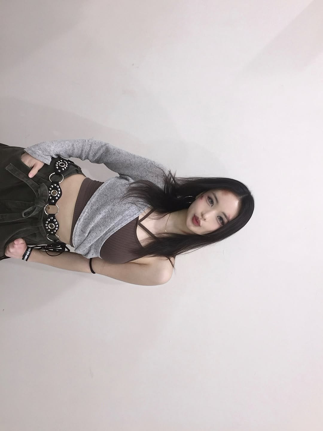 Photo by 김지원 on March 30, 2026. May be an image of one or more people, hair, top, costume, fishnet stockings and text.