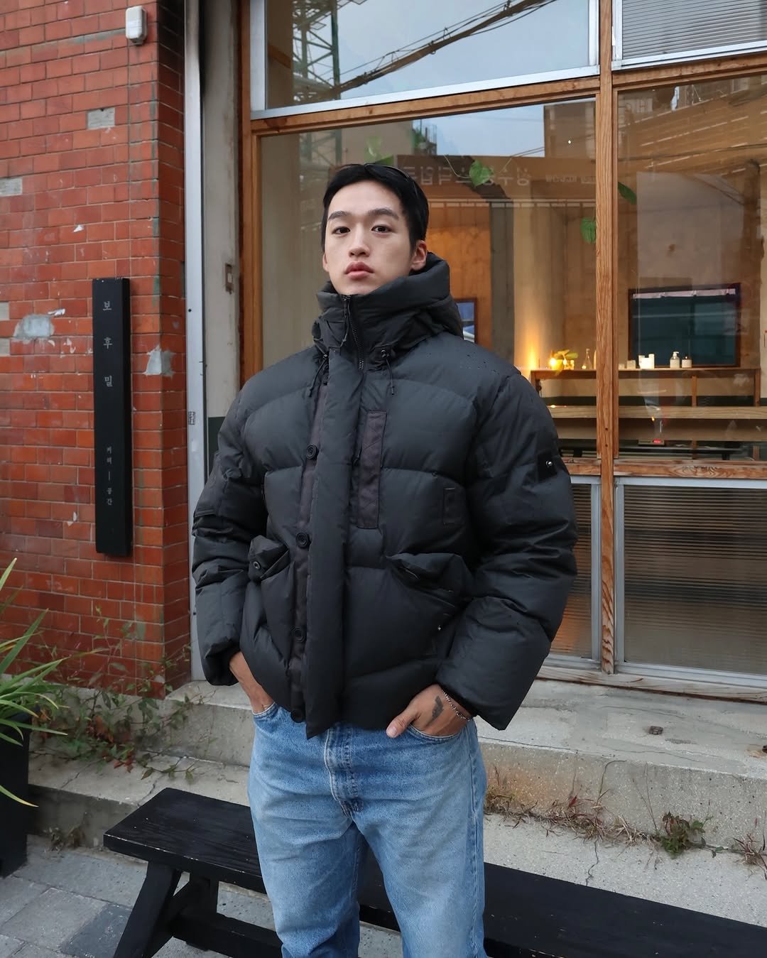 Photo shared by 지상근 / JIDAOL(지다올) on November 02, 2025 tagging @byseries_official, and @unaffected.official. May be an image of duffle coat, overcoat, goosedown coat, fleece, jacket, parka and text.