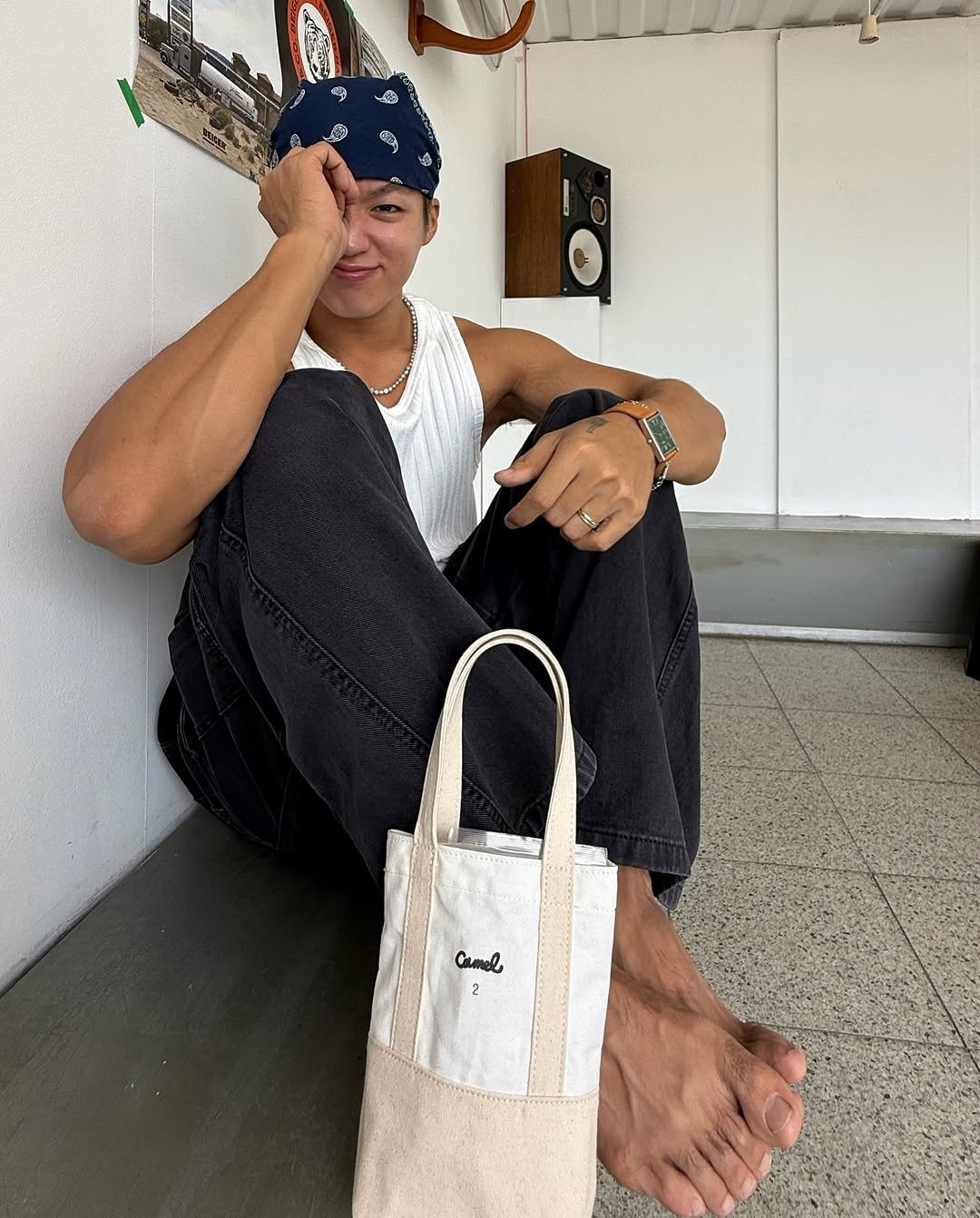 Photo shared by 지상근 / JIDAOL(지다올) on August 06, 2025 tagging @camelcoffee_kor. May be an image of 1 person, tool bag, bandanna, grocery bag, sling and text.