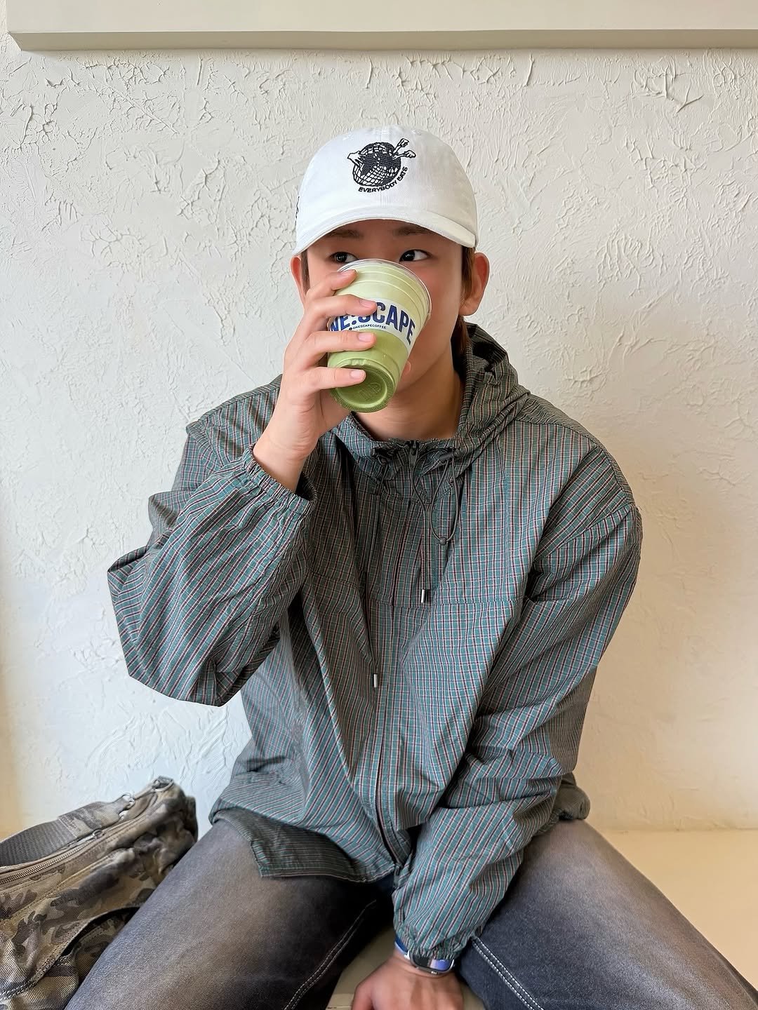 Photo by 잽잽 • Jabb on October 19, 2025. May be an image of hat, bolo tie, outerwear, cornflower and text.