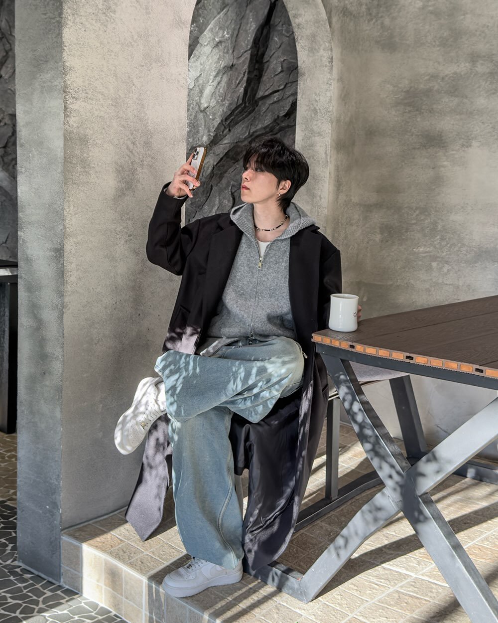 Photo by 지금JIIGEUM❄️ on December 11, 2025. May be an image of duffle coat, overcoat, sweatpants and text.