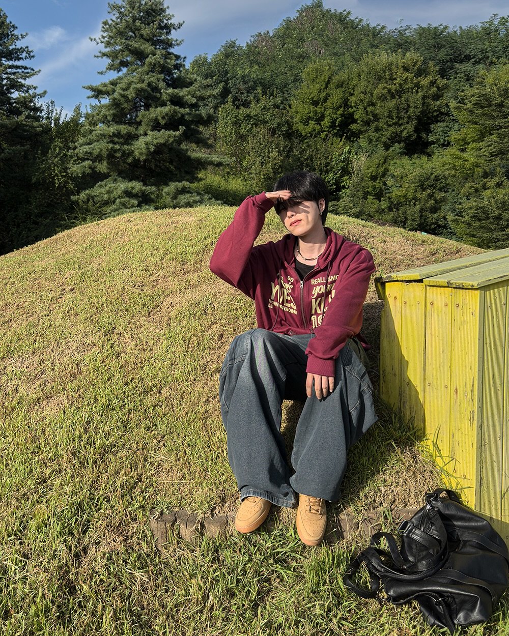 Photo by 지금JIIGEUM🍁 on September 09, 2025. May be an image of 1 person, grass and text.