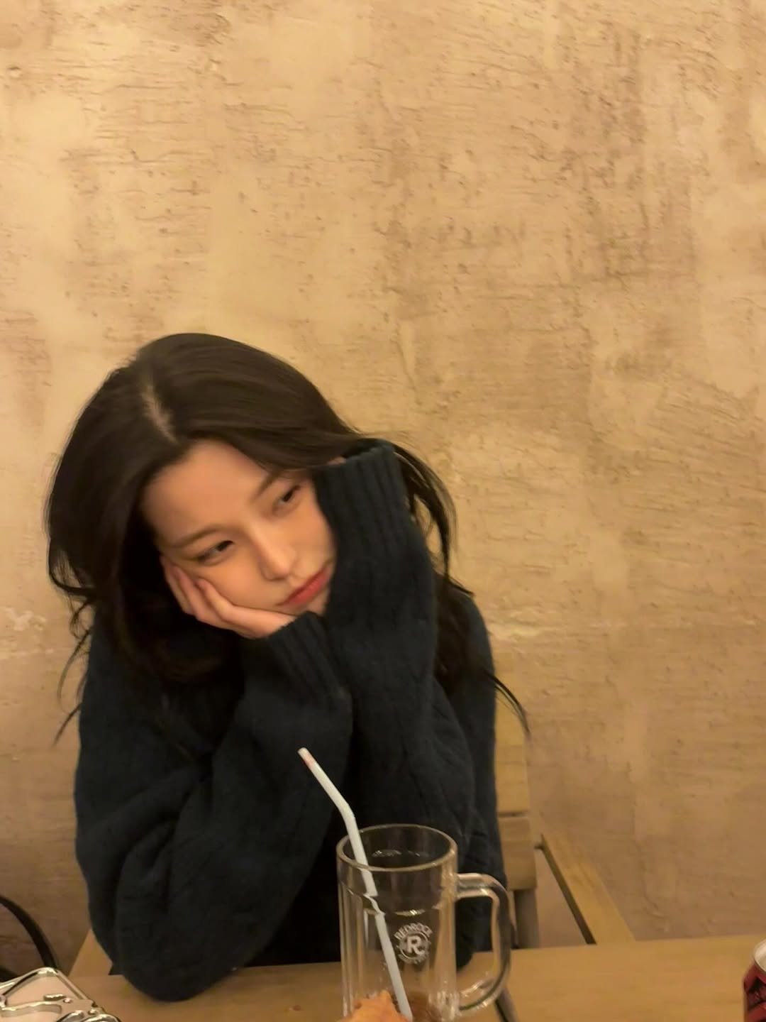 Photo by 백지헌 on November 26, 2025. May be an image of one or more people, hair, duffle coat, parka, turtleneck and text.