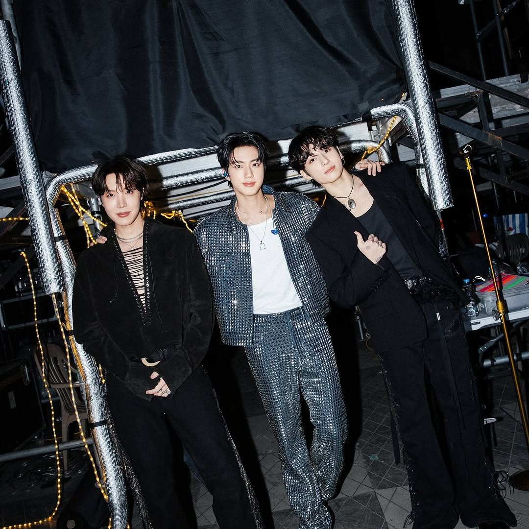 Photo by Jin of BTS on October 31, 2025. May be an image of bolo tie and text.