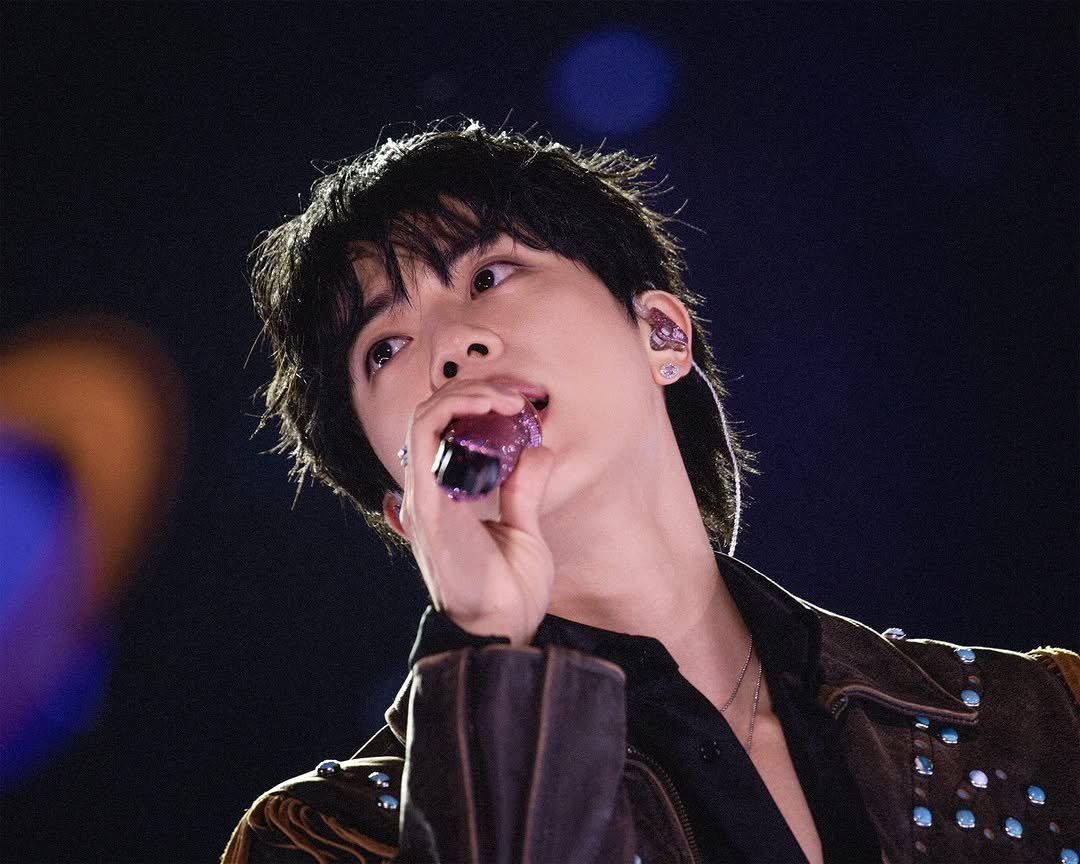Photo by Jin of BTS on November 01, 2025. May be an image of one or more people, bangs, concert and text.
