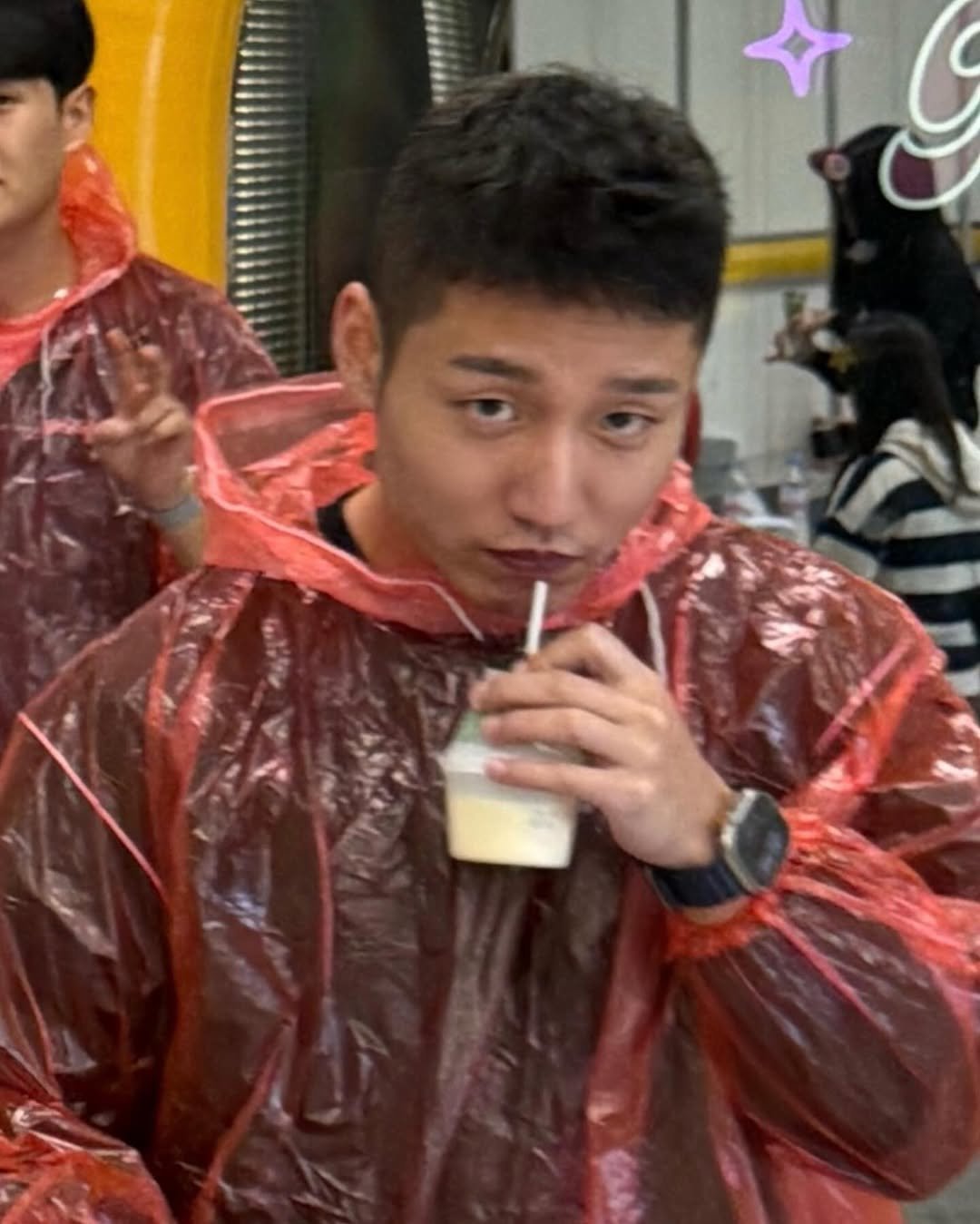 Photo by 진돗개 on September 30, 2025. May be an image of 1 person, raincoat, parka and text.