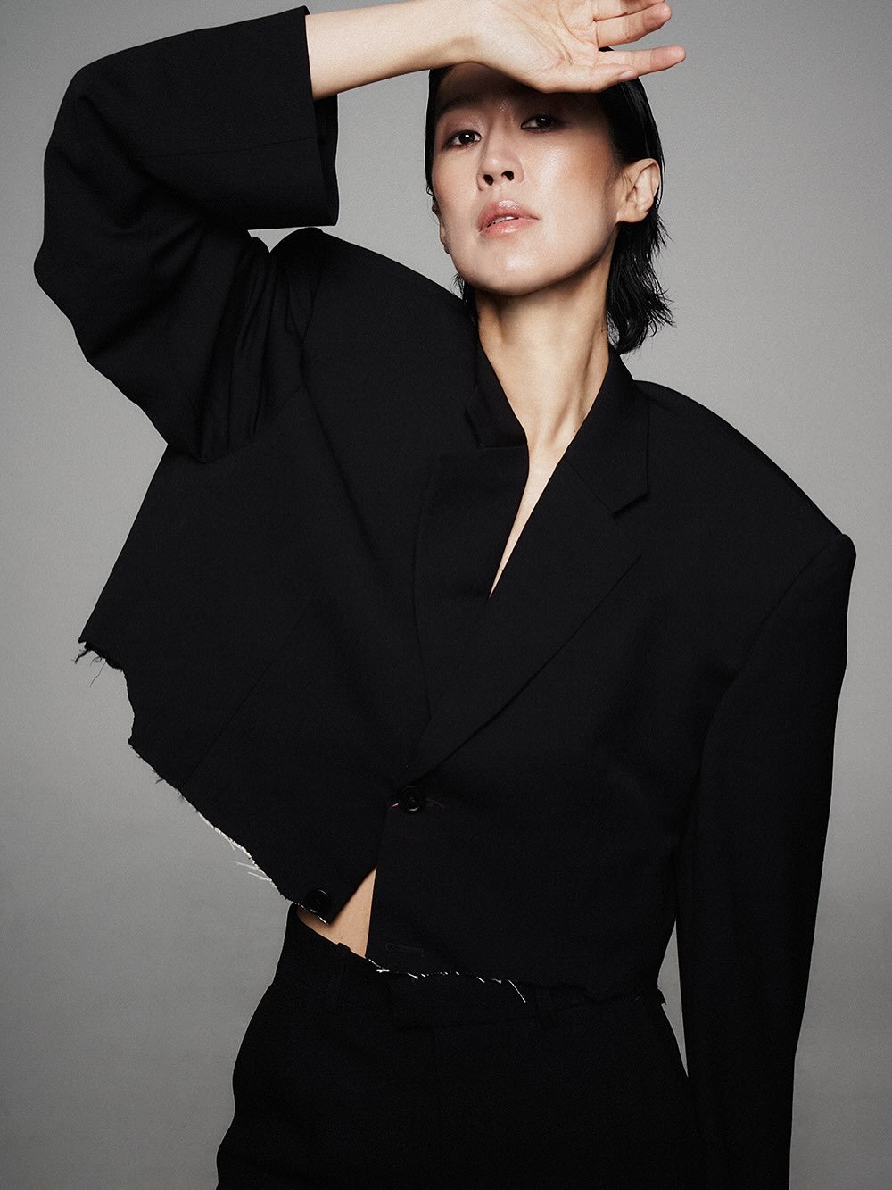 Photo by 홍진경 on July 17, 2025. May be an image of 1 person, makeup, suit, outerwear, blazer and text.
