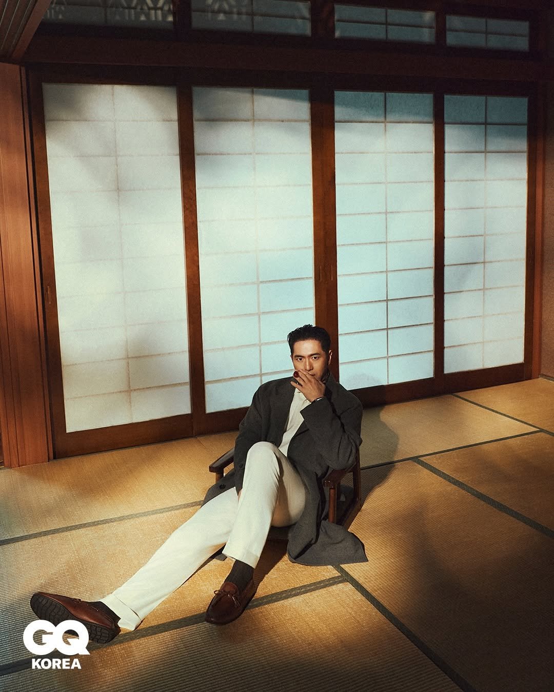 Photo shared by Lee Jinuk 이진욱 on January 31, 2026 tagging @ralphlauren. May be an image of suit, cigarette and text that says 'GQ KOREA'.