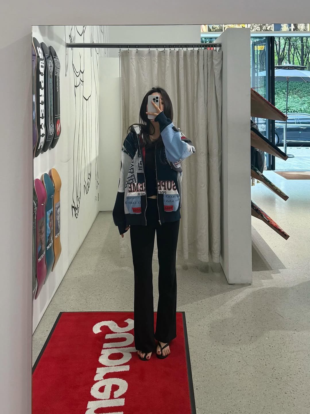 Photo shared by 지 원 on August 05, 2025 tagging @supremenewyork, and @modiattico_official. May be an image of 1 person, standing, clothes hanger and text.