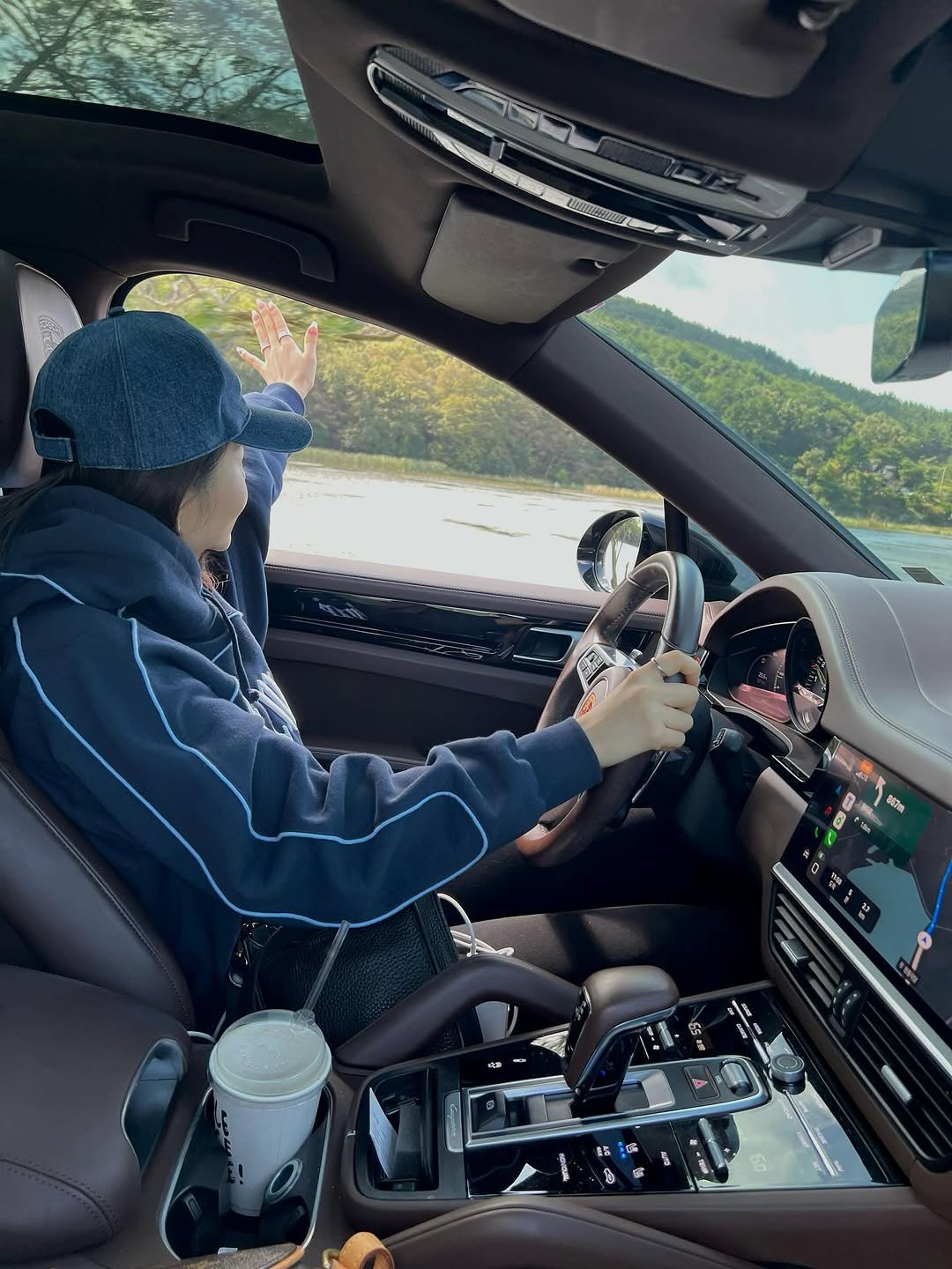 Photo by 지 원 on October 12, 2025. May be an image of car, windshield, limousine, road and text.