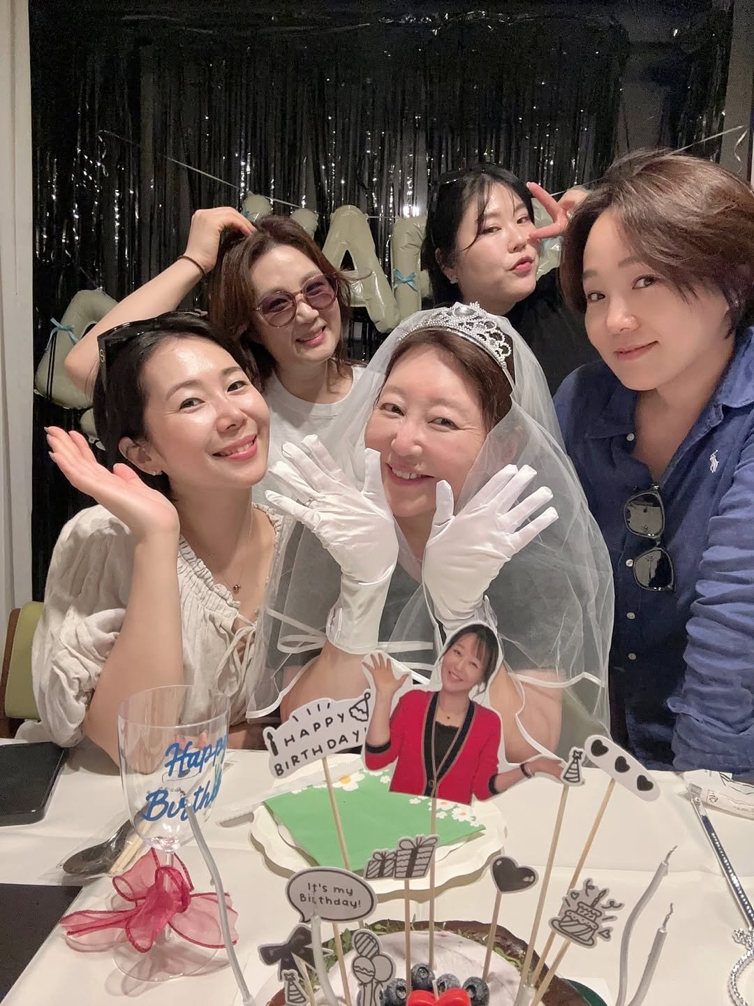 Photo by 이지영 on July 24, 2025. May be an image of 4 people and text.
