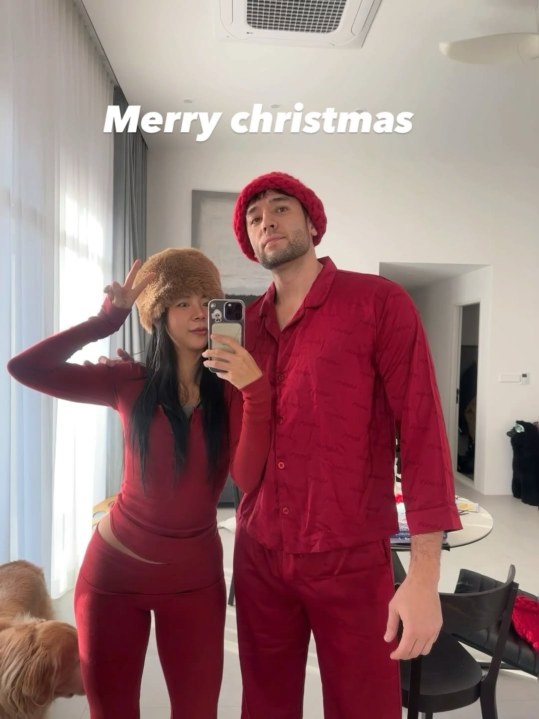 Photo shared by 제이제이 | 박지은 on December 24, 2025 tagging @skims, and @verish.official. May be a selfie of christmas tree, gingerbread cookie, bath robe, sweatpants and text that says 'Merry christmas'.