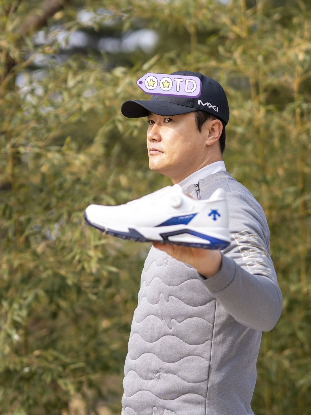 Photo by 신 정 균 on February 17, 2026. May be an image of golf, sportswear, sports equipment and text that says '**TD * TD MXI'.