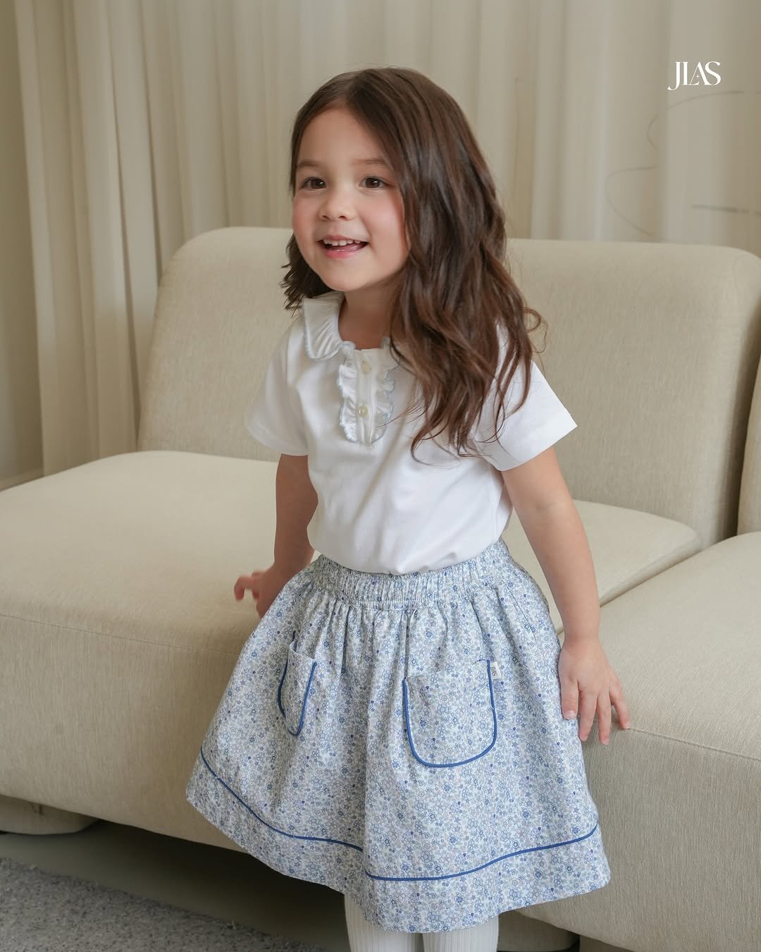 Photo by 제이라스 on April 14, 2026. May be an image of child, skirt and text that says 'JLAS'.