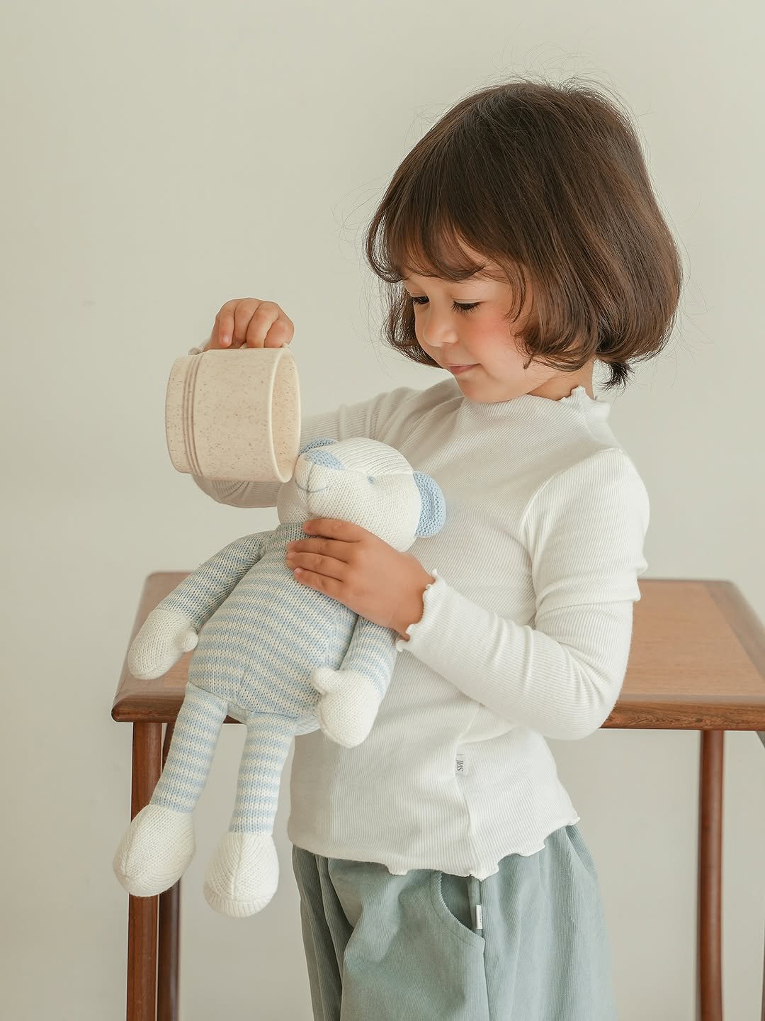 Photo by 제이라스 on September 10, 2025. May be an image of 1 person, baby, doll, crochet, knit and text.