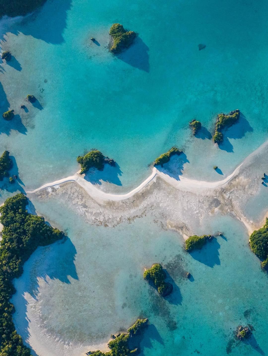 Photo shared by John john Florence on January 01, 2026 tagging @lauryn.florence. May be an image of swimming, body of water and text.