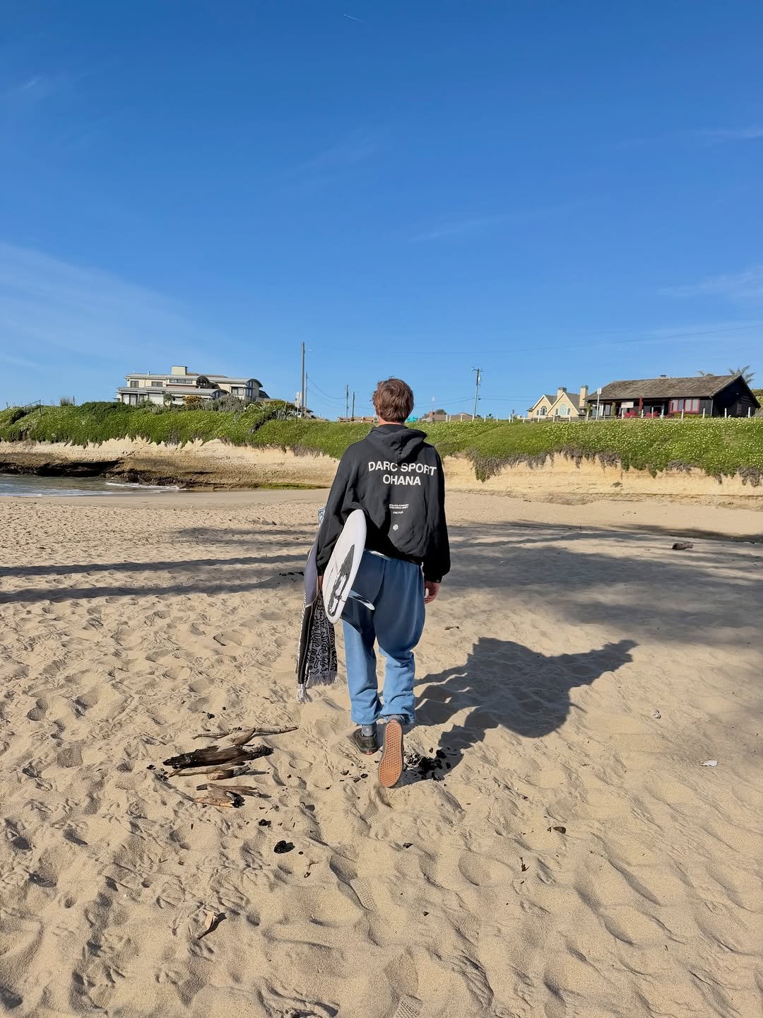 Photo shared by John Mel on March 26, 2026 tagging @darcsportathletics. May be an image of wetsuit, ocean, beach, coast and text.