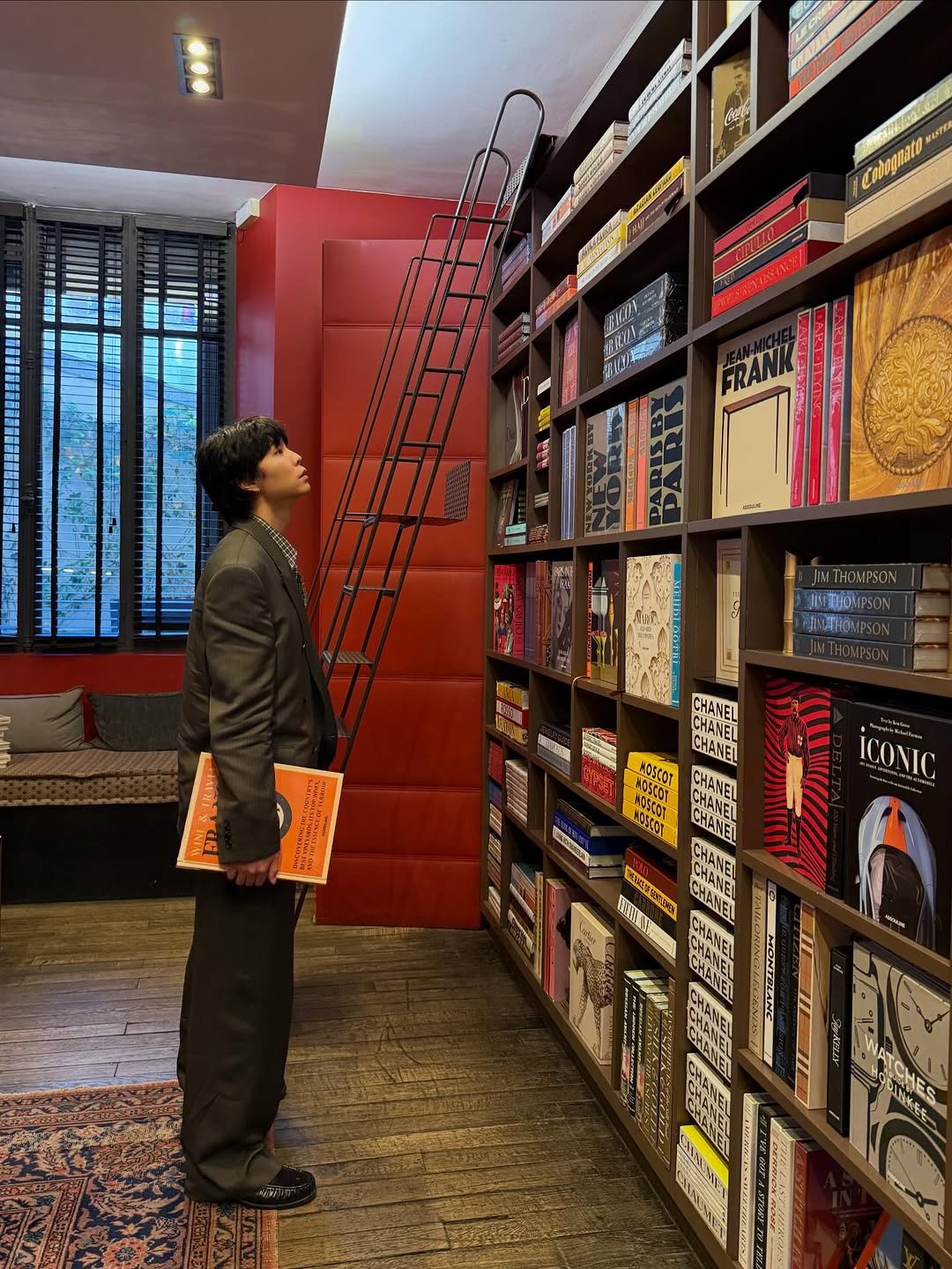 Photo by Johnny Suh on March 04, 2026. May be an image of bowler hat, book, ladder, rack, indoors and text.