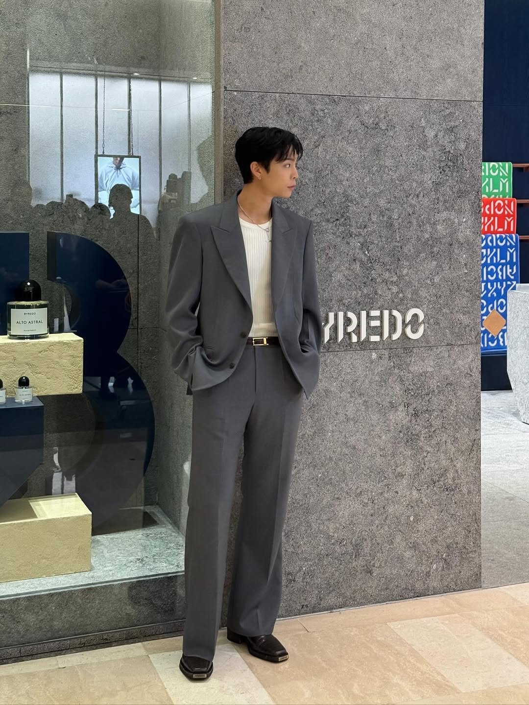 Photo shared by Johnny Suh on November 20, 2025 tagging @officialbyredo. May be an image of suit, overcoat and text.