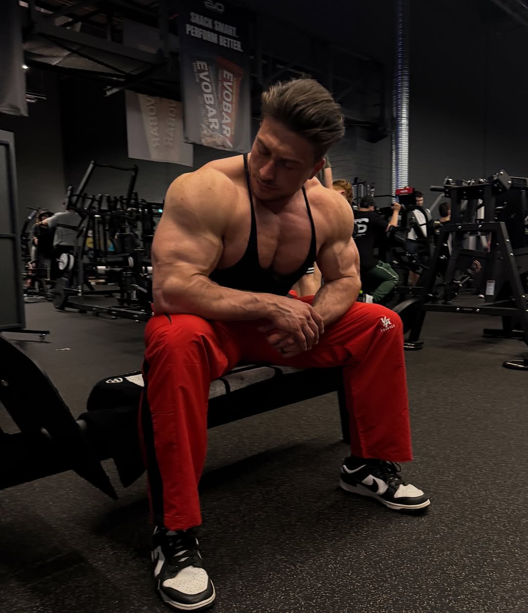 Photo by Johny Münster | The German Phoenix 🐦‍🔥 on April 27, 2026. May be an image of one or more people, biceps, people bodybuilding, dumbbell, sweatpants and text.