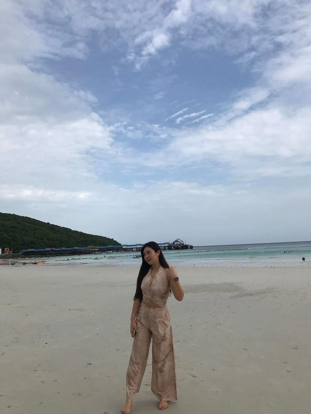 Photo by 이신율 on July 10, 2025. May be an image of 1 person, sarong, sundress, jumpsuit, ocean, beach and text.