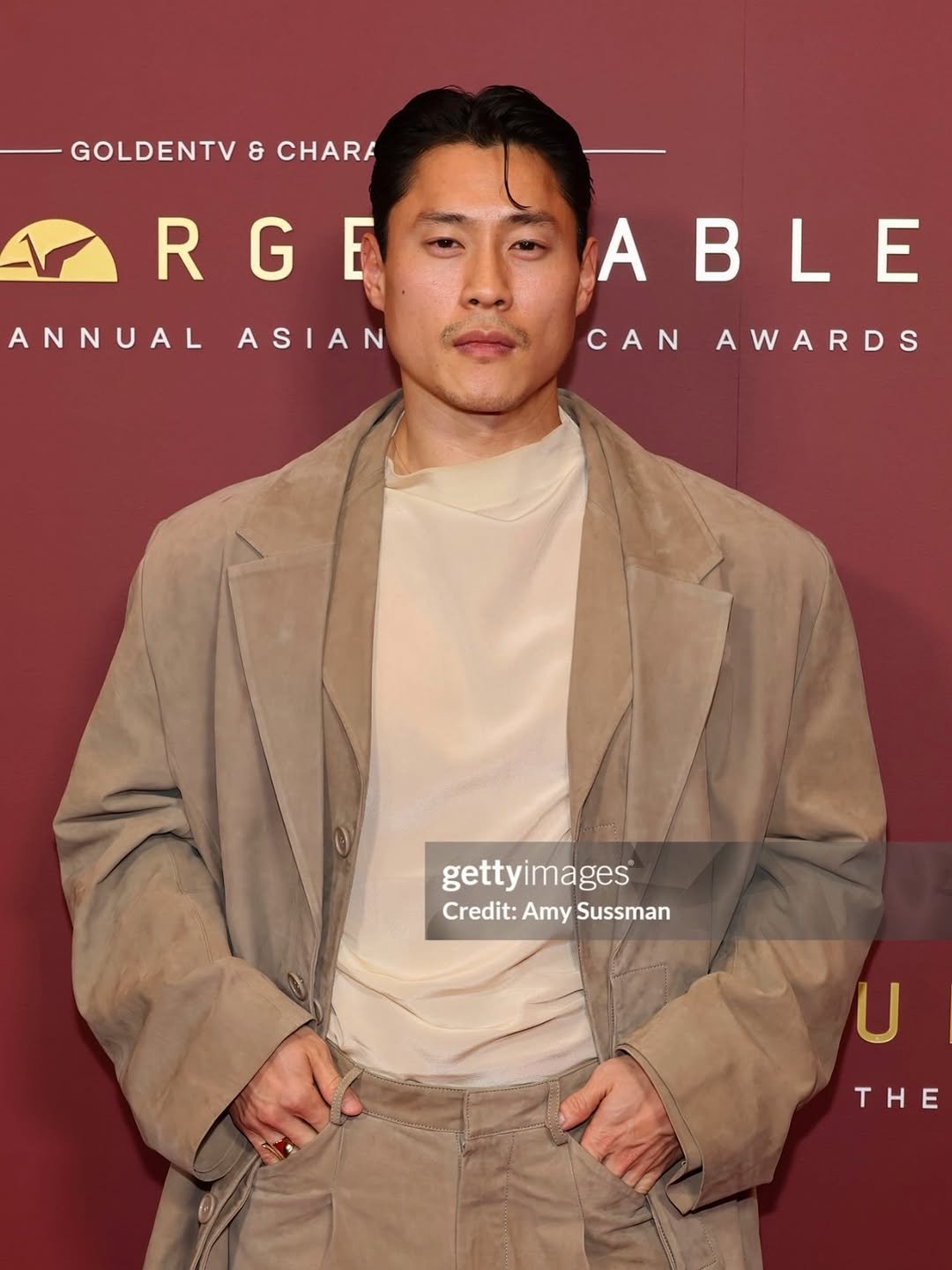 Photo shared by Jon Moon on March 09, 2026 tagging @entire_studios, and @saltmurphy. May be an image of magazine, carpet and text that says 'GOLDENTV & CHARA RGE E R G ANNUALASIAN ANNUAL ASIAN A ABLE L CANAWARDS CAN AWARDS gettyimages® Credit: Amy Credit:AmySussman Sussman U THE'.