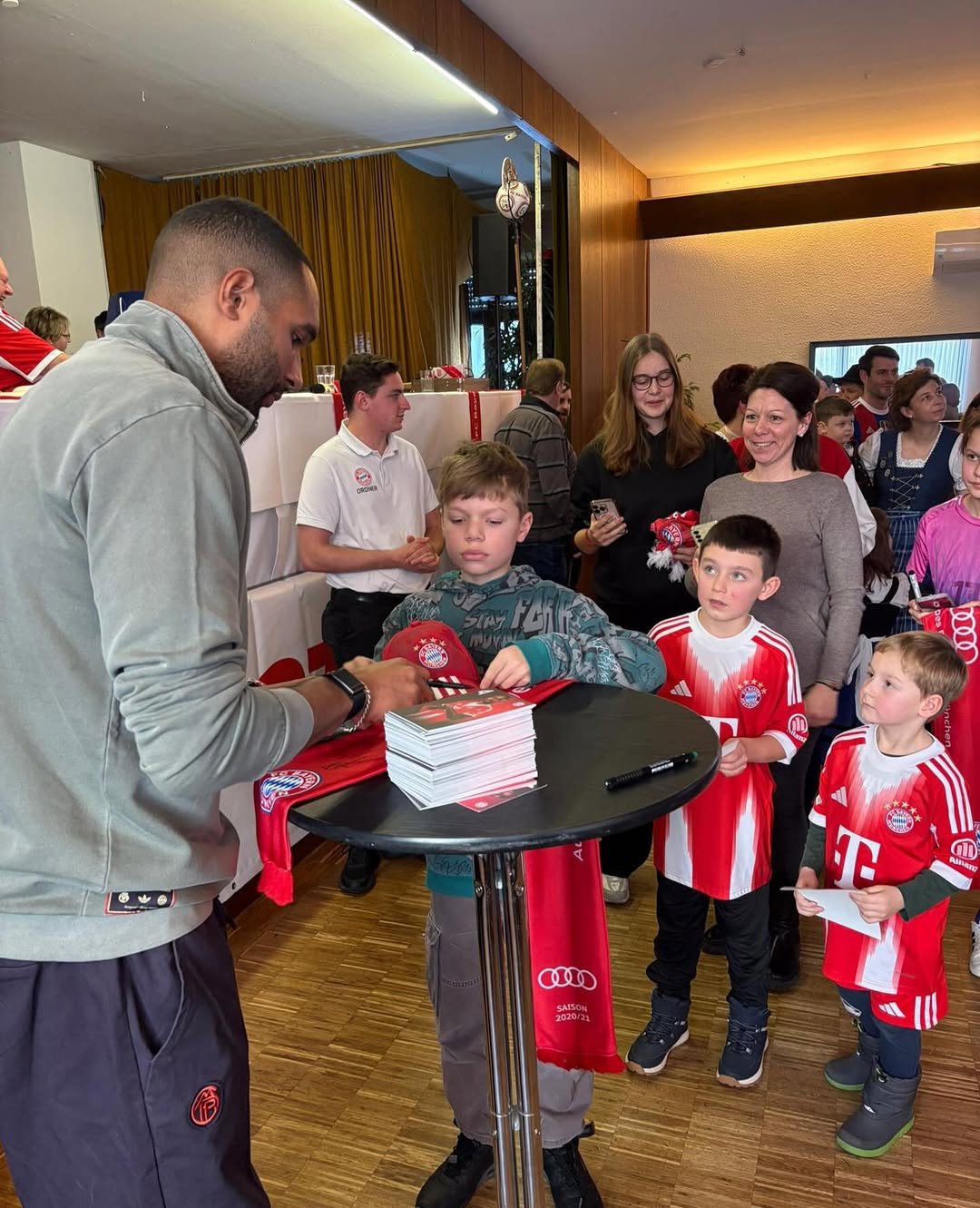 Photo by Jonathan Tah on January 08, 2026. May be an image of soccer, football, ball, sports equipment, crowd and text that says 'G O ATANG OD 2010/21 2820/21'.