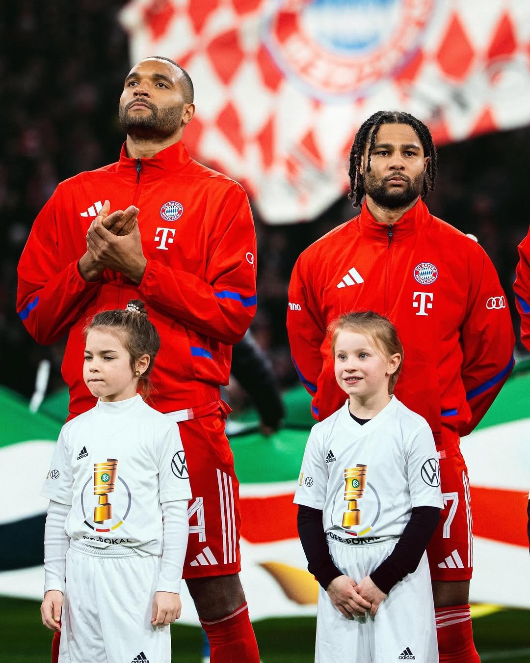 Photo shared by Jonathan Tah on February 12, 2026 tagging @sergegnabry. May be an image of football, soccer, stadium and text.