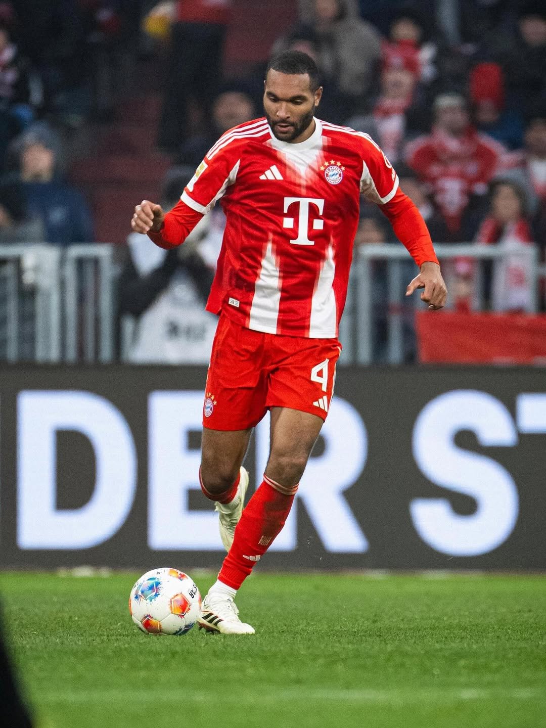 Photo by Jonathan Tah on January 24, 2026. May be an image of football, soccer, stadium and text that says 'T ሰበል DERS S S DE 一取野'.