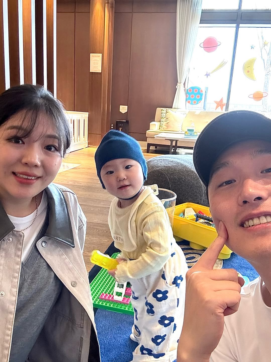 Photo shared by 죠니 | 깐깐육아 on March 24, 2026 tagging @kiiimansu, and @gwakzi. May be an image of one or more people, duffle coat, lego and text.