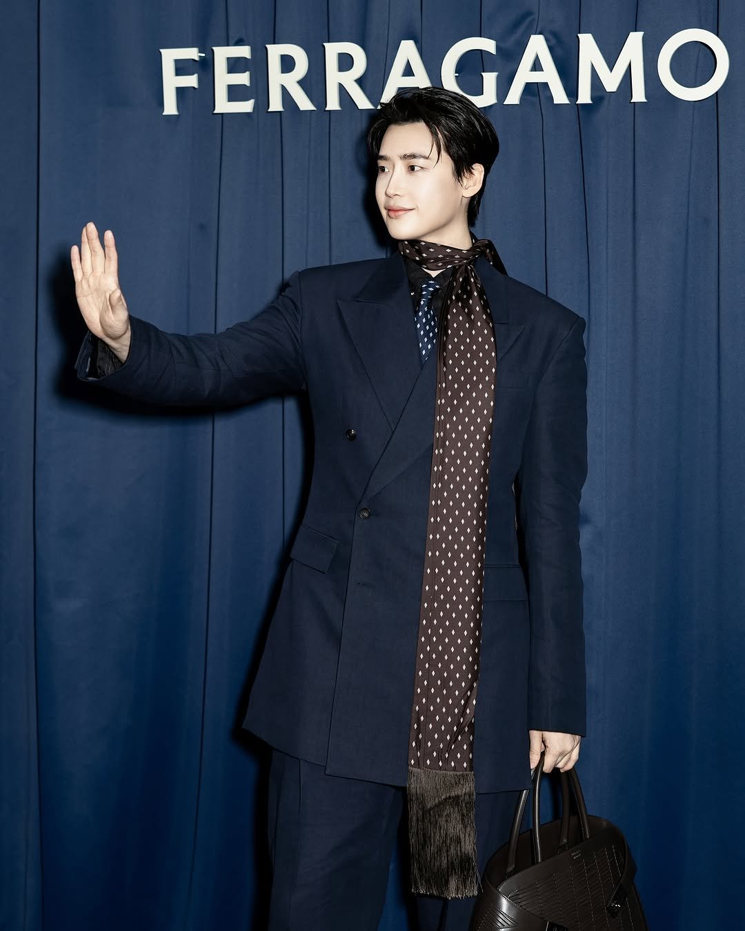 Photo shared by 이종석 on March 02, 2026 tagging @ferragamo. May be an image of suit and text that says 'FERRAGAMO'.